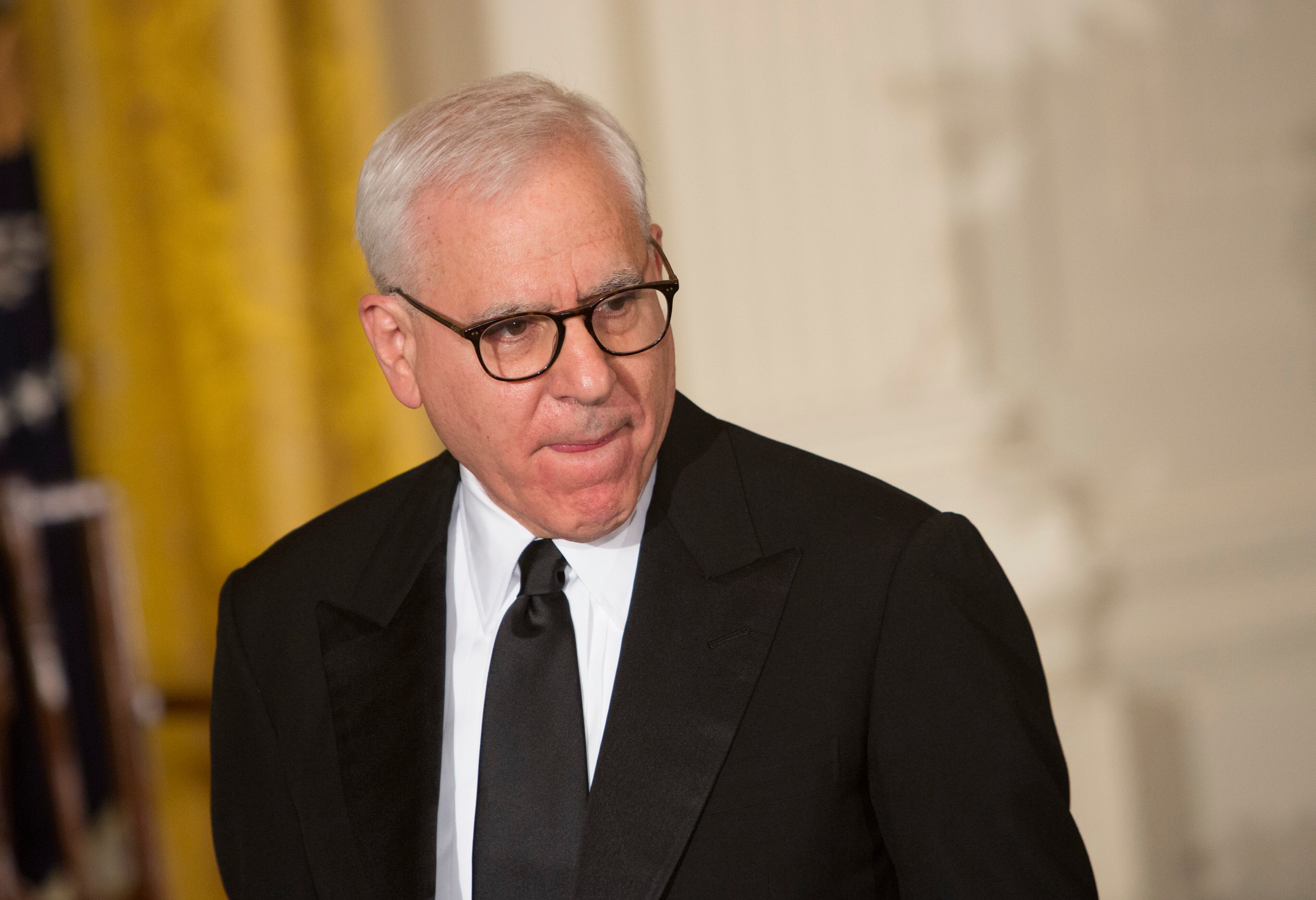 Kennedy Center Chairman David M. Rubenstein arrives for the reception honoring the 2015 Kennedy Center Honors recipients December 6, 2015 at The White House in Washington, DC. AFP Photo/ Chris Kleponis / AFP / CHRIS KLEPONIS (Photo credit should read CHRIS KLEPONIS/AFP/Getty Images)