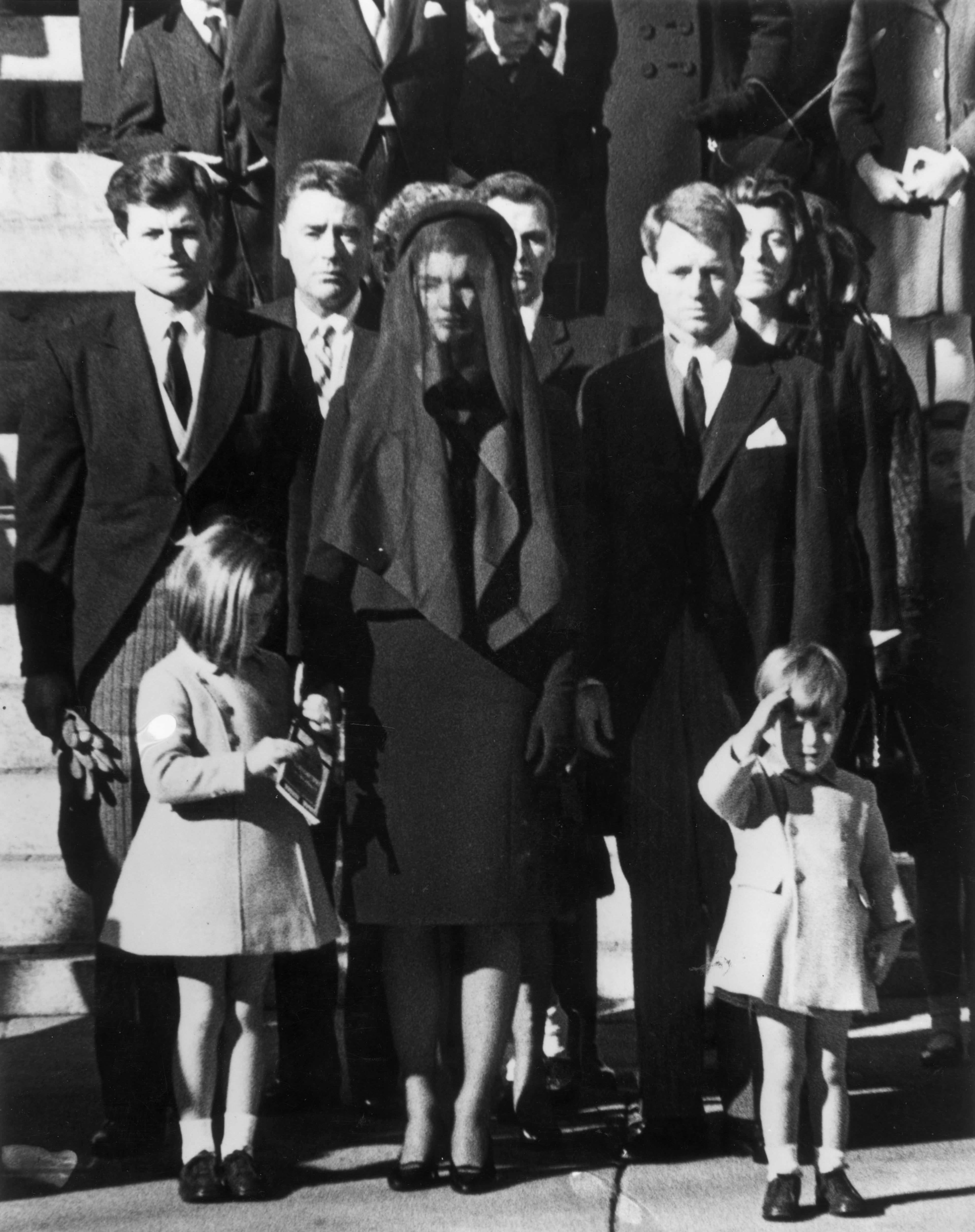 Members of the Kennedy family at the funeral of assassinated president John F. Kennedy at Washington DC. From left: Senator Edward Kennedy, Caroline Kennedy, (aged 6), Jackie Kennedy (1929 - 1994), Attorney General Robert Kennedy and John Kennedy (1960 - 1999) (aged 3). (Photo by Keystone/Getty Images)
