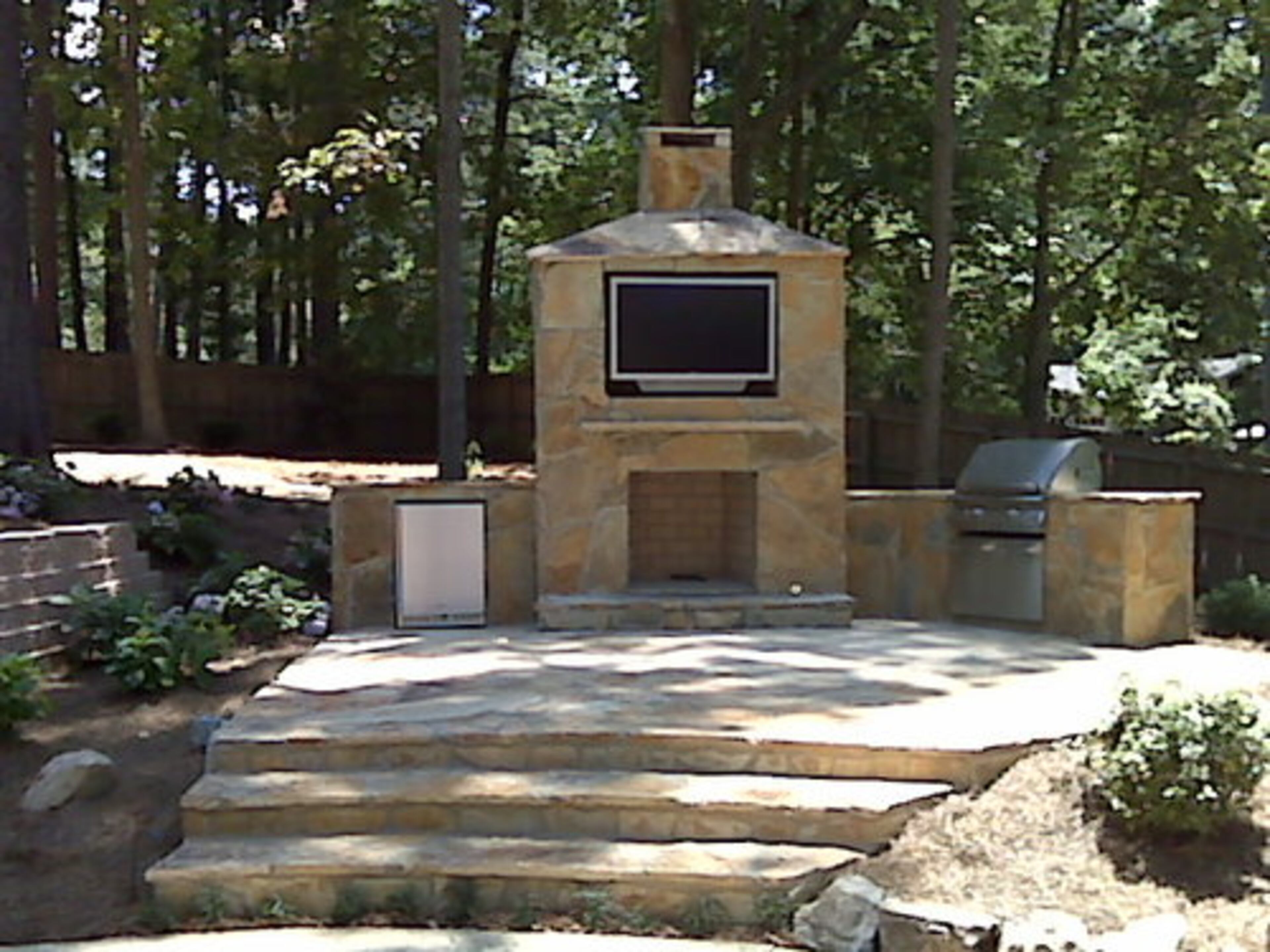 BIGGEST SPLURGE: The outdoor kitchen and television. The Hyams originally wanted a stone fireplace, but later decided to splurge on this SunBrite 46" all-weather outdoor television and kitchen.