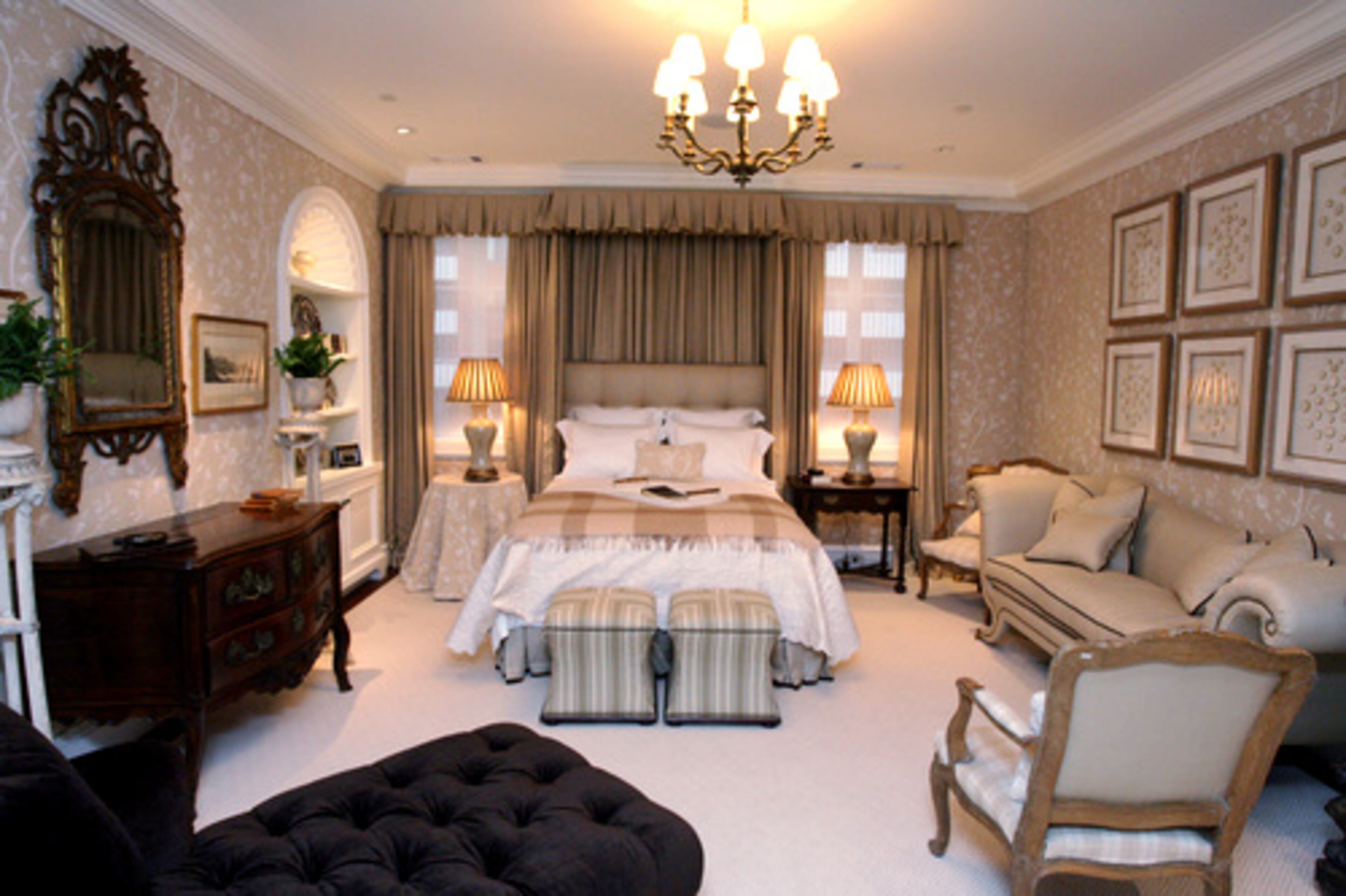 The angel canopy over the bed has the same houndstooth fabric found on the sofa. The Gables Antiques provided the chest; the mirror above the chest is from William Word Fine Antiques.