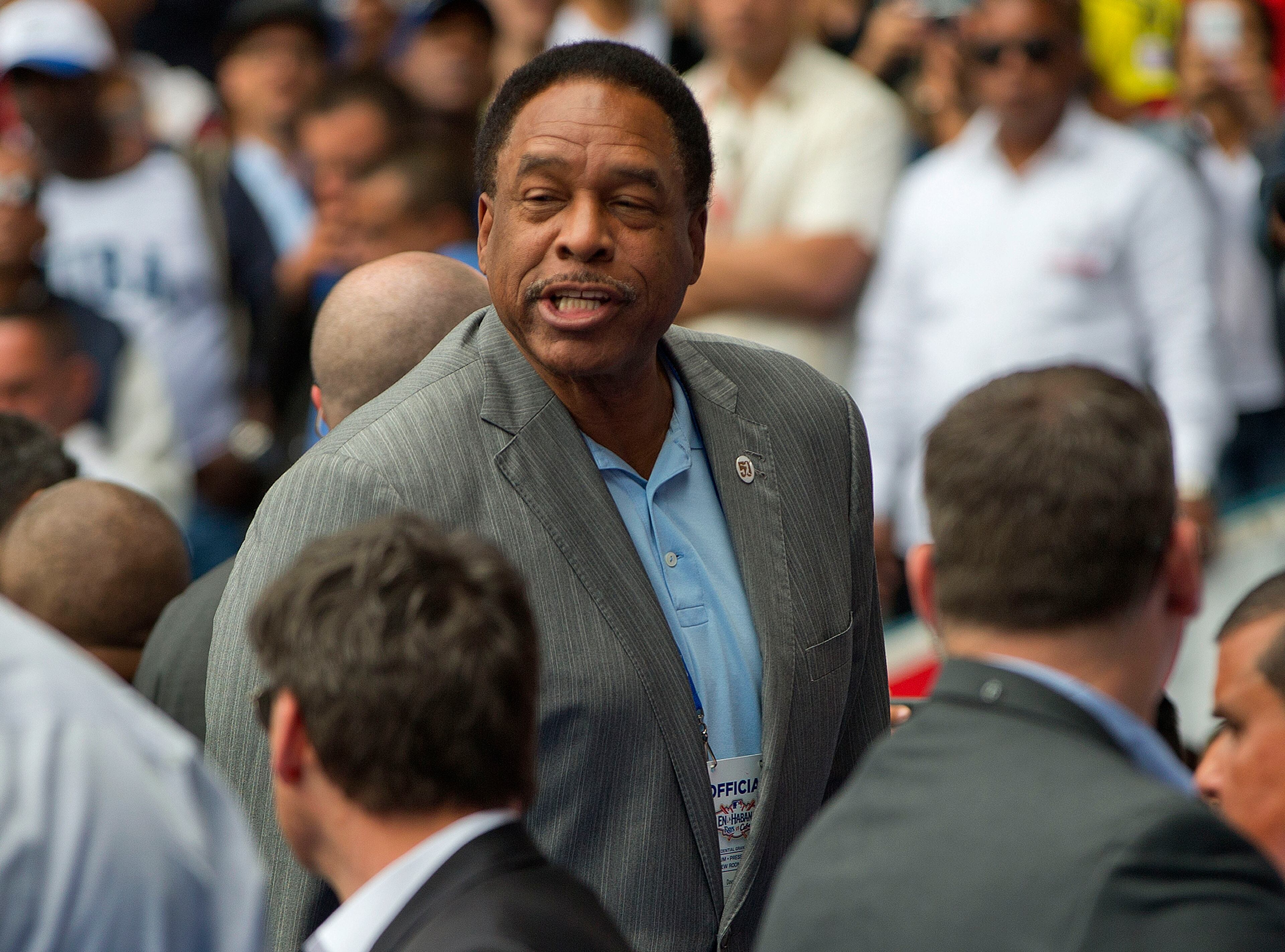 Former baseball player, hall-of-famer Dave Winfield takes his seat for the game. (AP Photo/Pablo Martinez Monsivais)