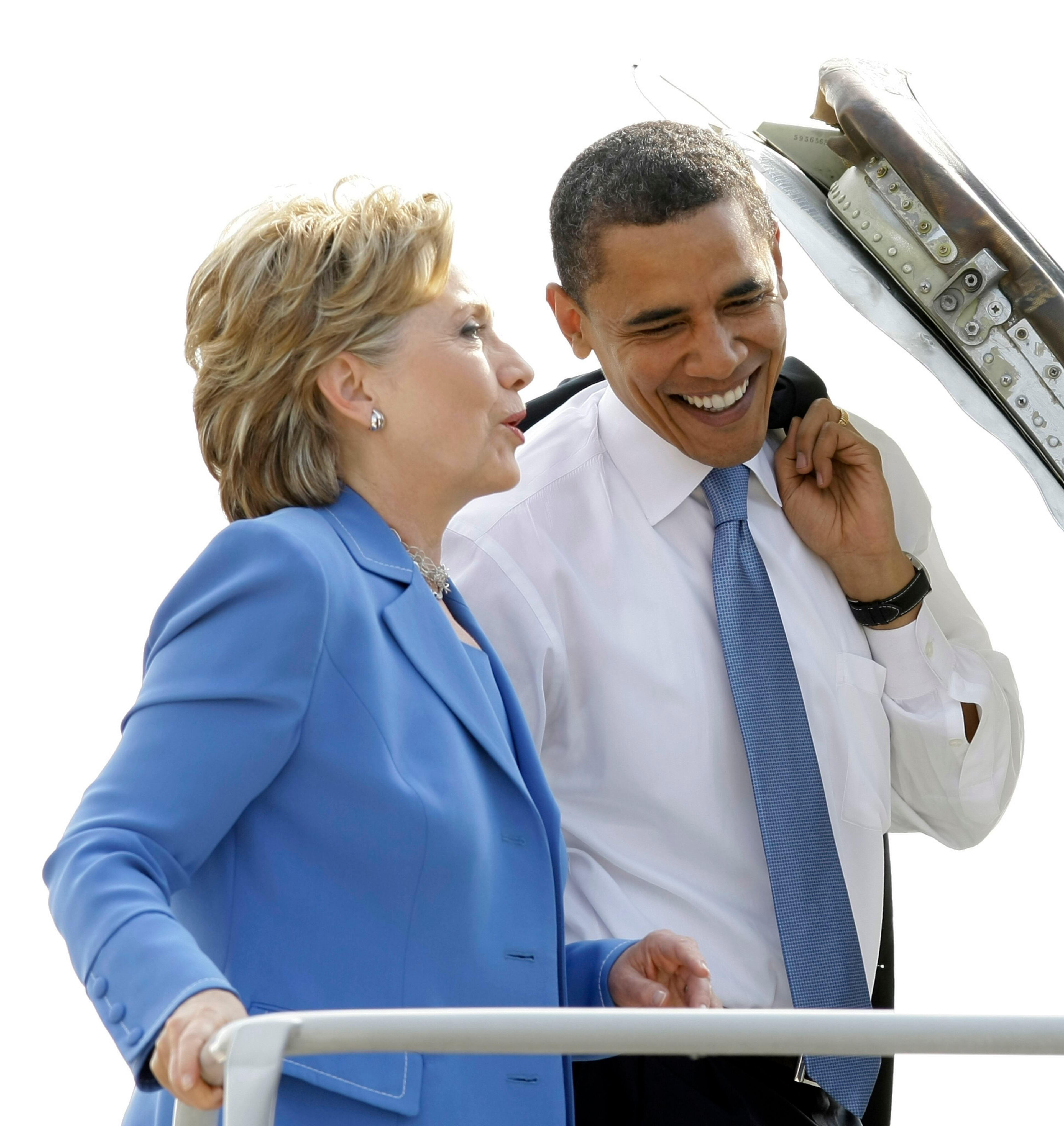In this Friday, June 27, 2008 file photo, Democratic presidential candidate Sen. Barack Obama, D-Ill., boards a plane with Sen. Hillary Clinton, D-N.Y., at Washington's Ronald Reagan National Airport. (AP Photo/Alex Brandon)
