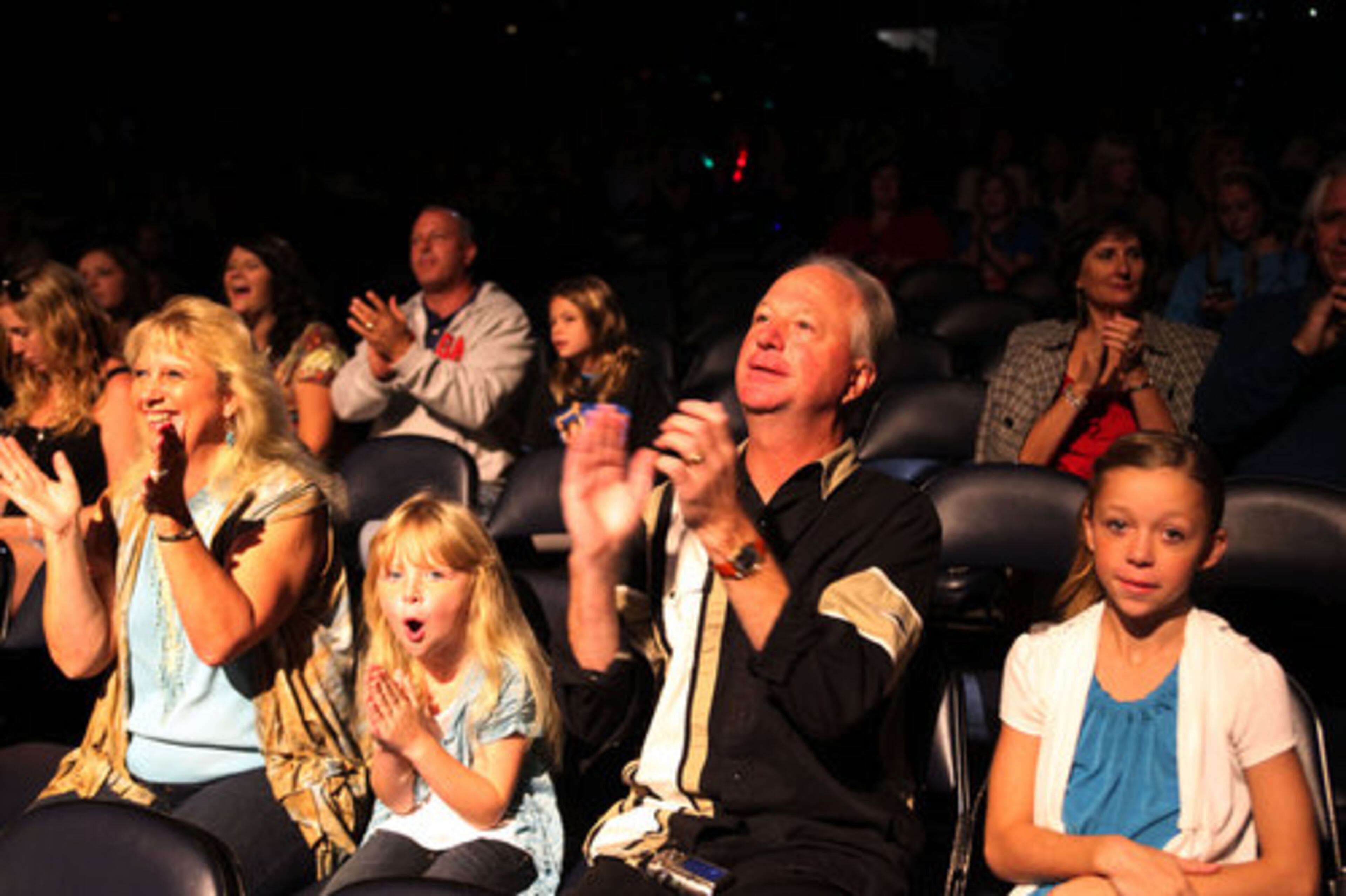 From left, Trixie, Kayley, Andy and Mitzi Roukoski from Marietta take in Danny Gokey's opening set Saturday night at Philips Arena.