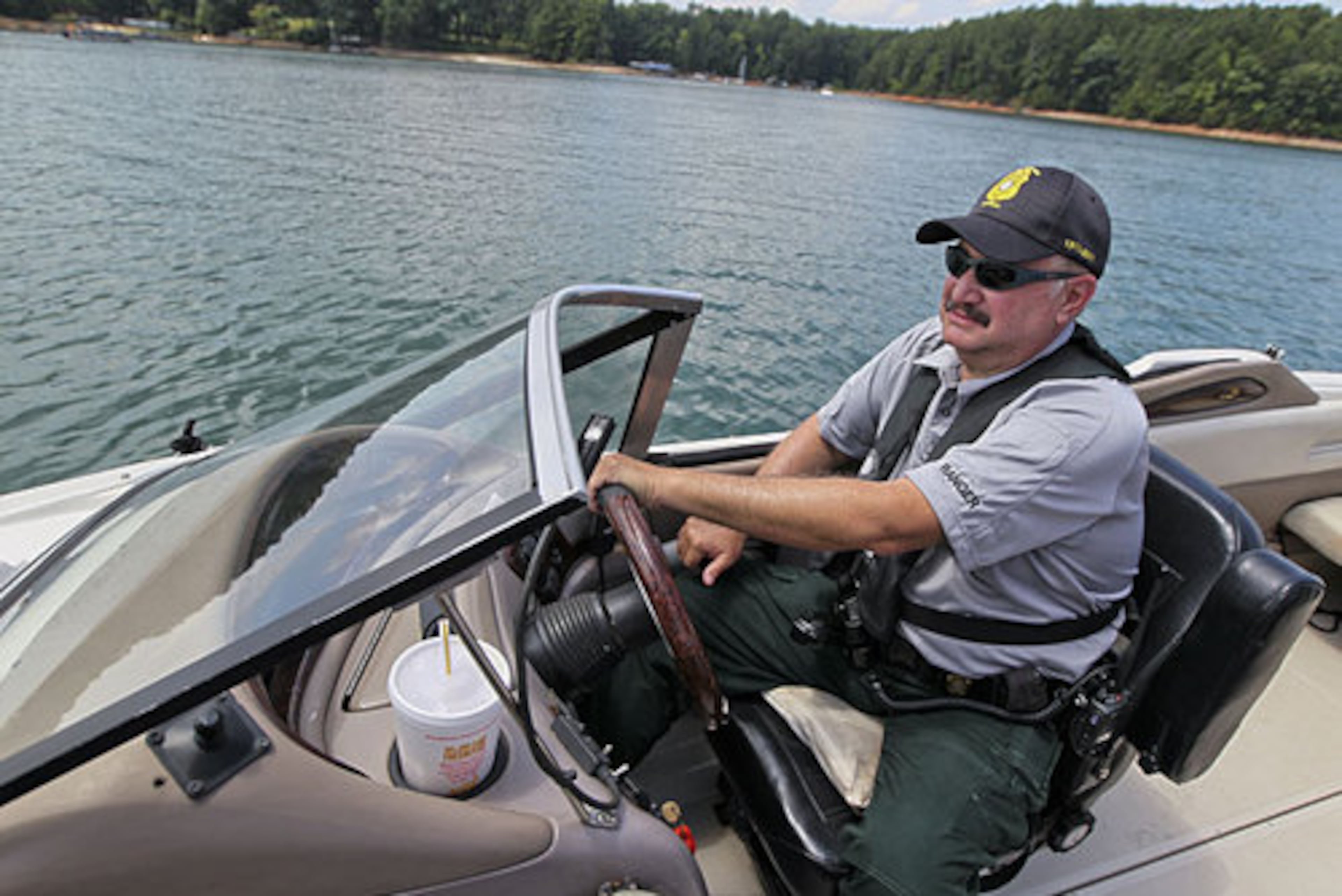 DNR Ranger First Class Mitchell Crump classified the search, which began at 11:30 p.m. Monday, June 18, as a recovery effort - dive teams from Forsyth and Hall counties continued searching for the missing 13-year-old thrown from the pontoon boat Tuesday June 19, 2012.