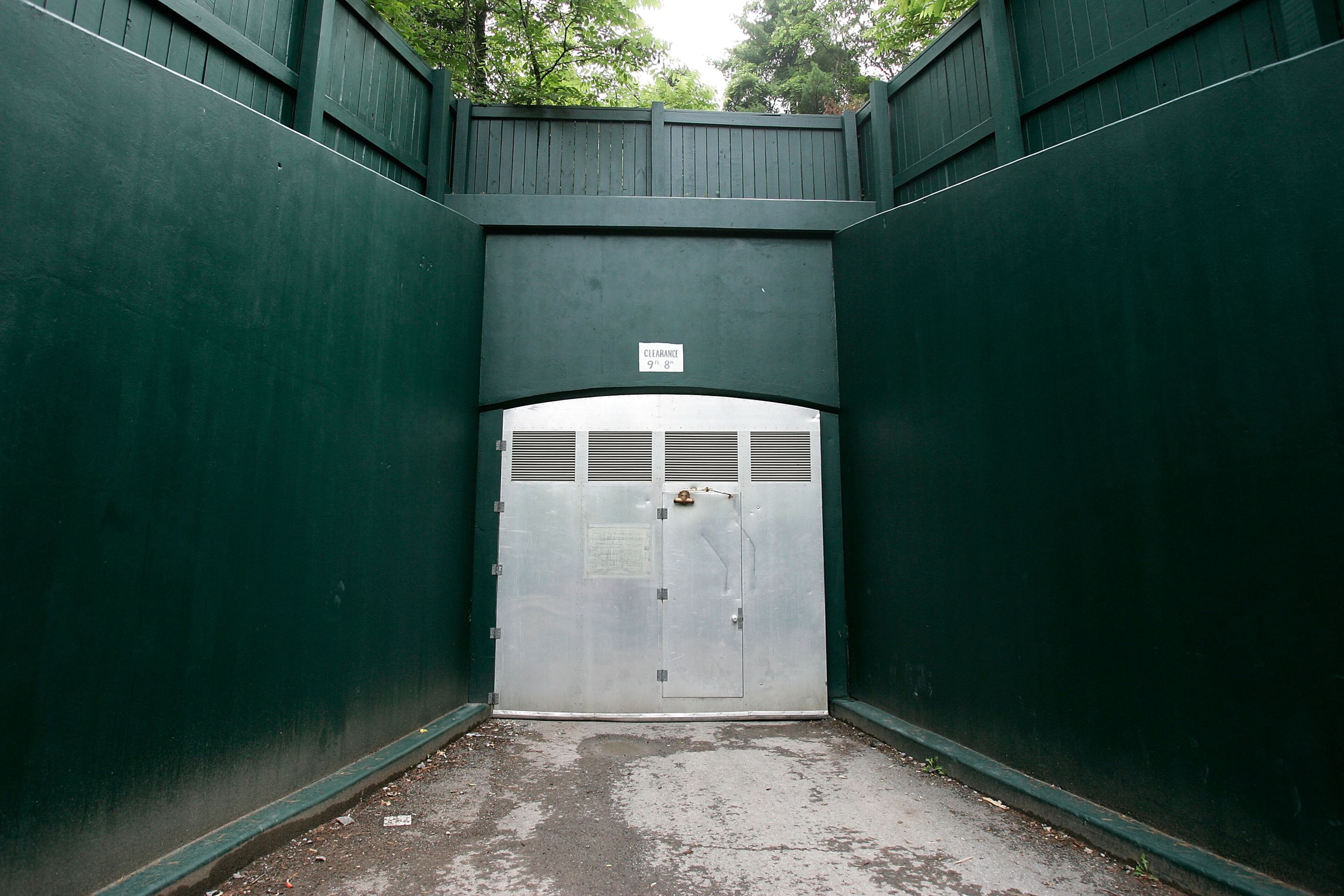 WHITE SULPHUR SPRINGS, WV - JULY 14: One of the three outside entrances of a former government relocation facility, also know as "the bunker," is seen during a media tour at Greenbrier Resort July 14, 2006 in White Sulphur Springs, West Virginia. The bunker, codenamed "Project Greek Island" and planned by the Eisenhower Administration, was a 112,000 square-foot shelter constructed beneath the Greenbrier Resort's West Virginia Wing, to serve as a relocation site for members of the U.S. Congress and associated staff in the event of a nuclear attack on the U.S. soil. The facility was built between 1958 and 1961 and was maintained in a state of operational readiness until the government terminated the lease with the resort in 1995. The bunker will be reopened for public tours on August 20 after a two-year-long renovation. (Photo by Alex Wong/Getty Images)
