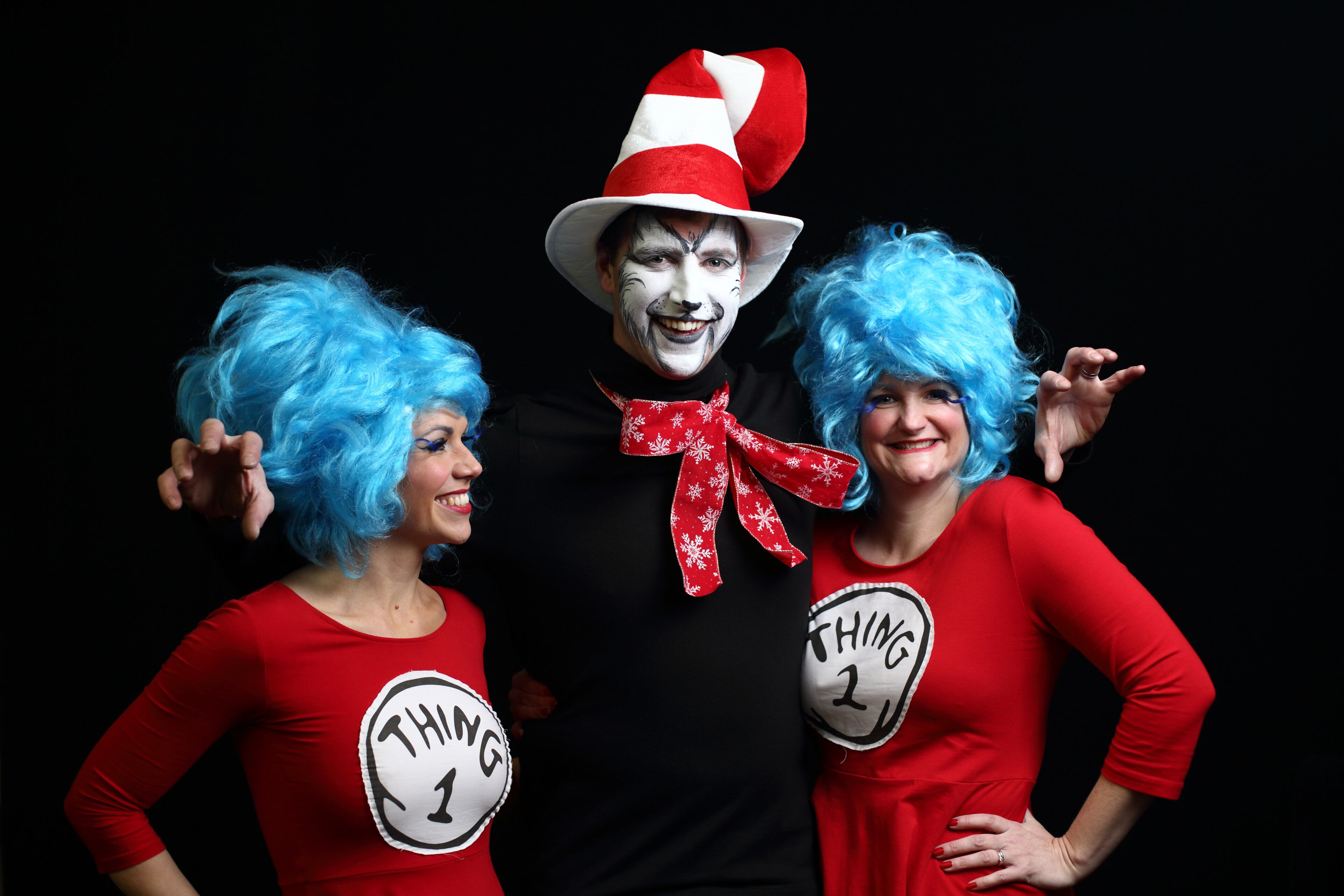 Darts fans Kelly Sutton (L), Gary Sutton (C) and Zoe Sutton (R) in fancy dress ahead Day Eight of the William Hill PDC World Darts Championships at Alexandra Palace on December 28, 2014 in London, England. (Photo by Jordan Mansfield/Getty Images)