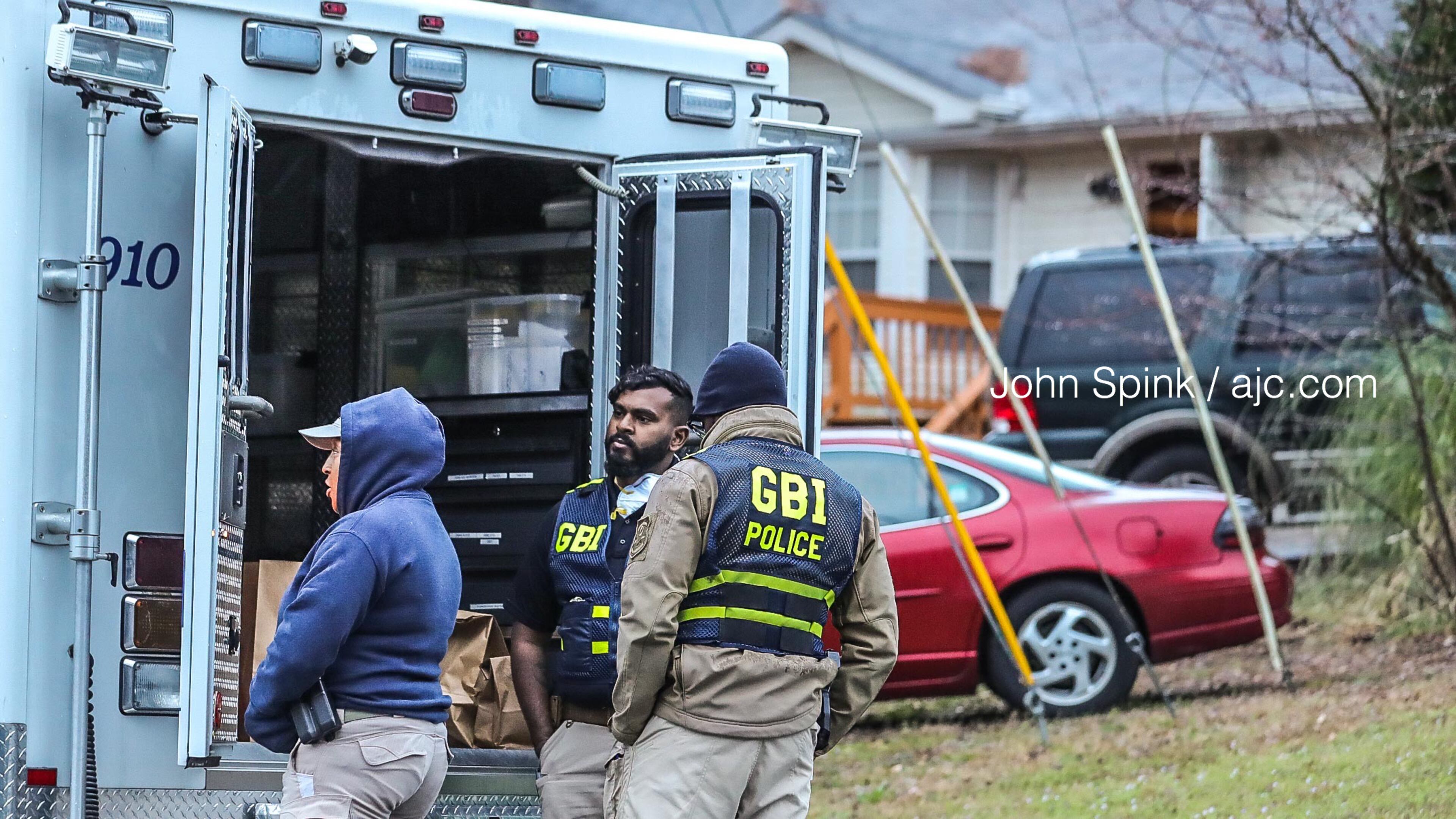 Palmetto police and GBI agents investigate a deadly shooting in a Palmetto neighborhood early Tuesday morning.