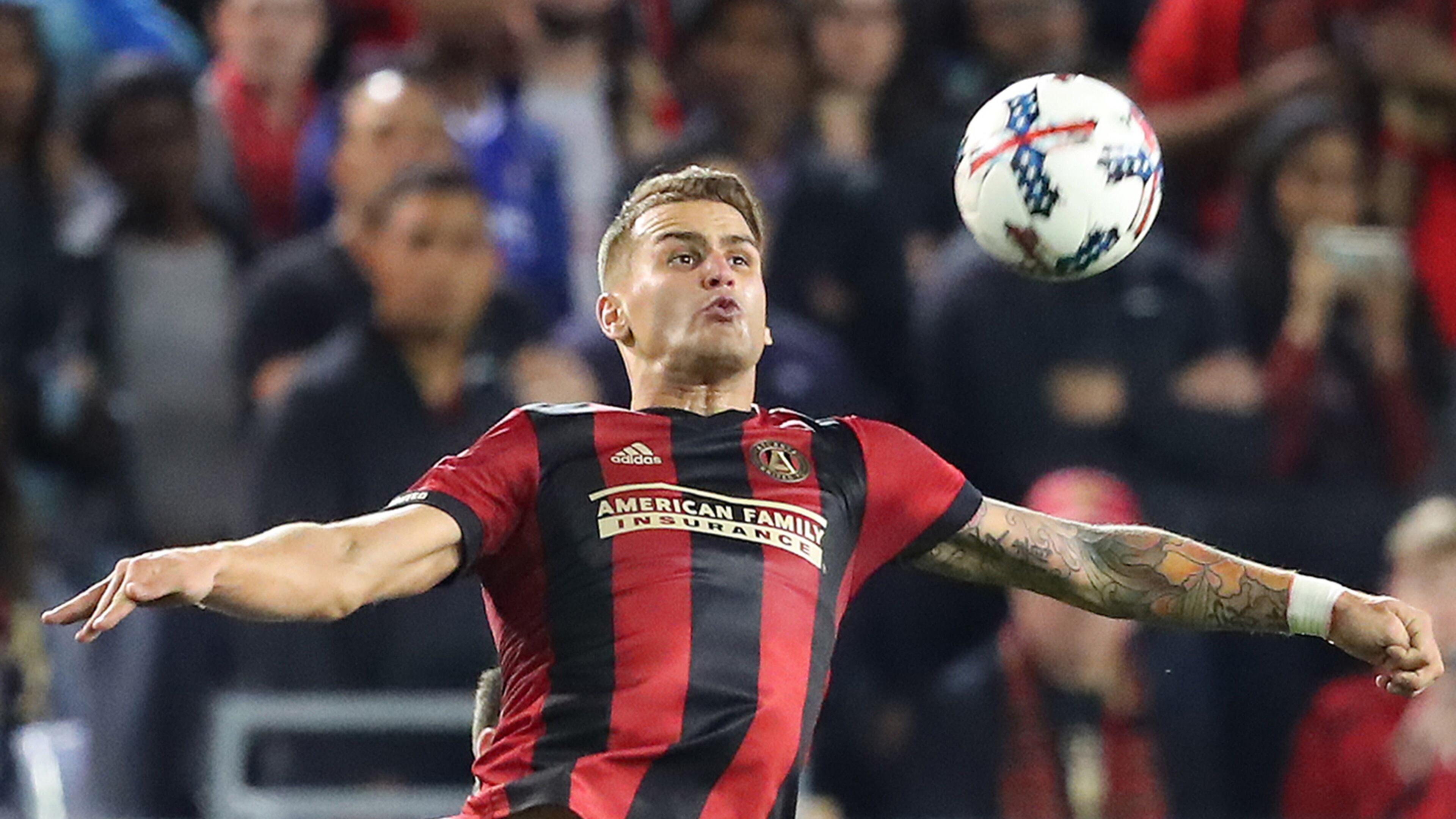 March 5, 2017, Atlanta: Atlanta United defender Leandro Gonzalez Pirez soars to the ball over a N.Y. Red Bulls player during the second half on Sunday, March 5, 2017, in Atlanta. Curtis Compton/ccompton@ajc.com