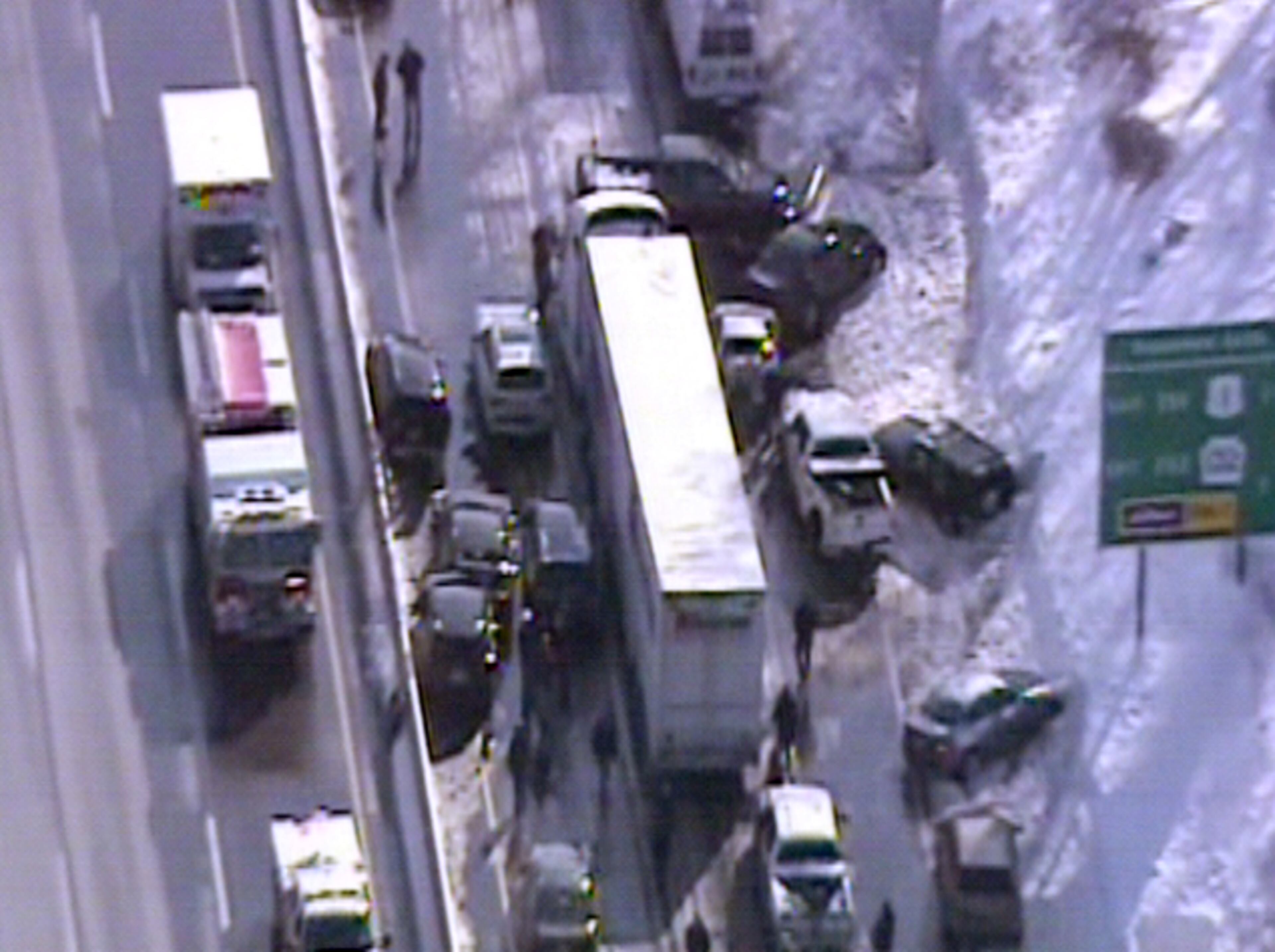 This video frame grab provided by Fox 29 Philadelphia shows traffic accidents involving multiple tractor trailers and dozens of cars on Pennsylvania Turnpike outside Philadelphia, on Friday, Feb. 14, 2014. The crashes were reported just after 8 a.m. Friday, one day after the area got about a foot of snow that left roads slick. Television news helicopter footage showed several tractor-trailers and dozens of cars involved in a series of accidents that had backed up traffic for miles between the Bensalem and Willow Grove exits. (AP Photo/Fox 29 Philadelphia)