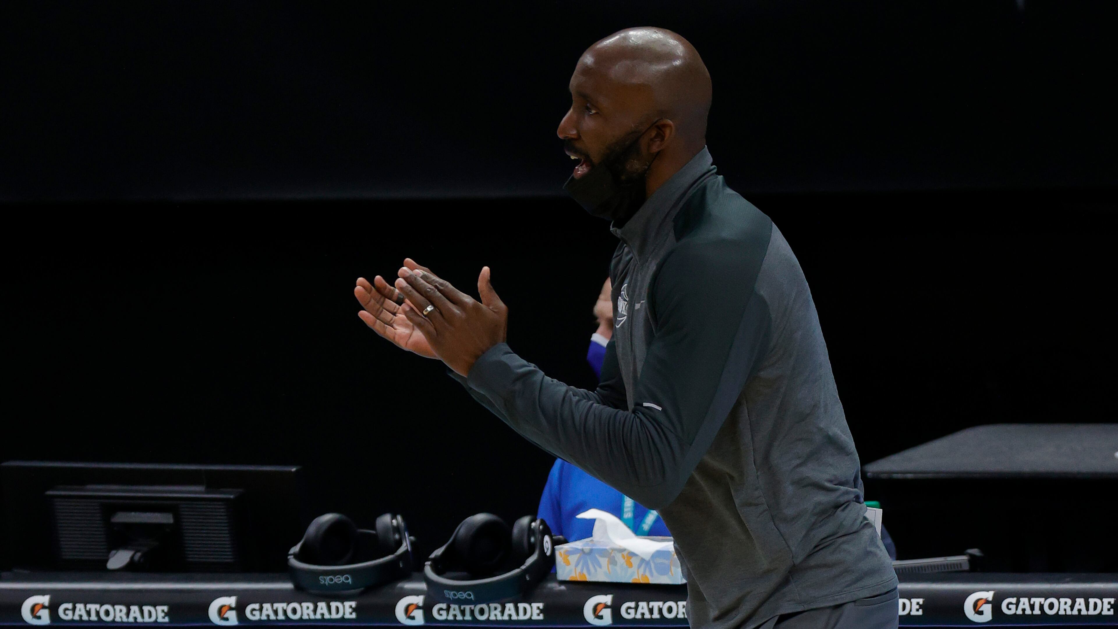Coach Lloyd Pierce of the Atanta Hawks reacts following a call during the first quarter of their game against the Charlotte Hornets at Spectrum Center on Jan. 9, 2021 in Charlotte, North Carolina. (Jared C. Tilton/Getty Images/TNS)