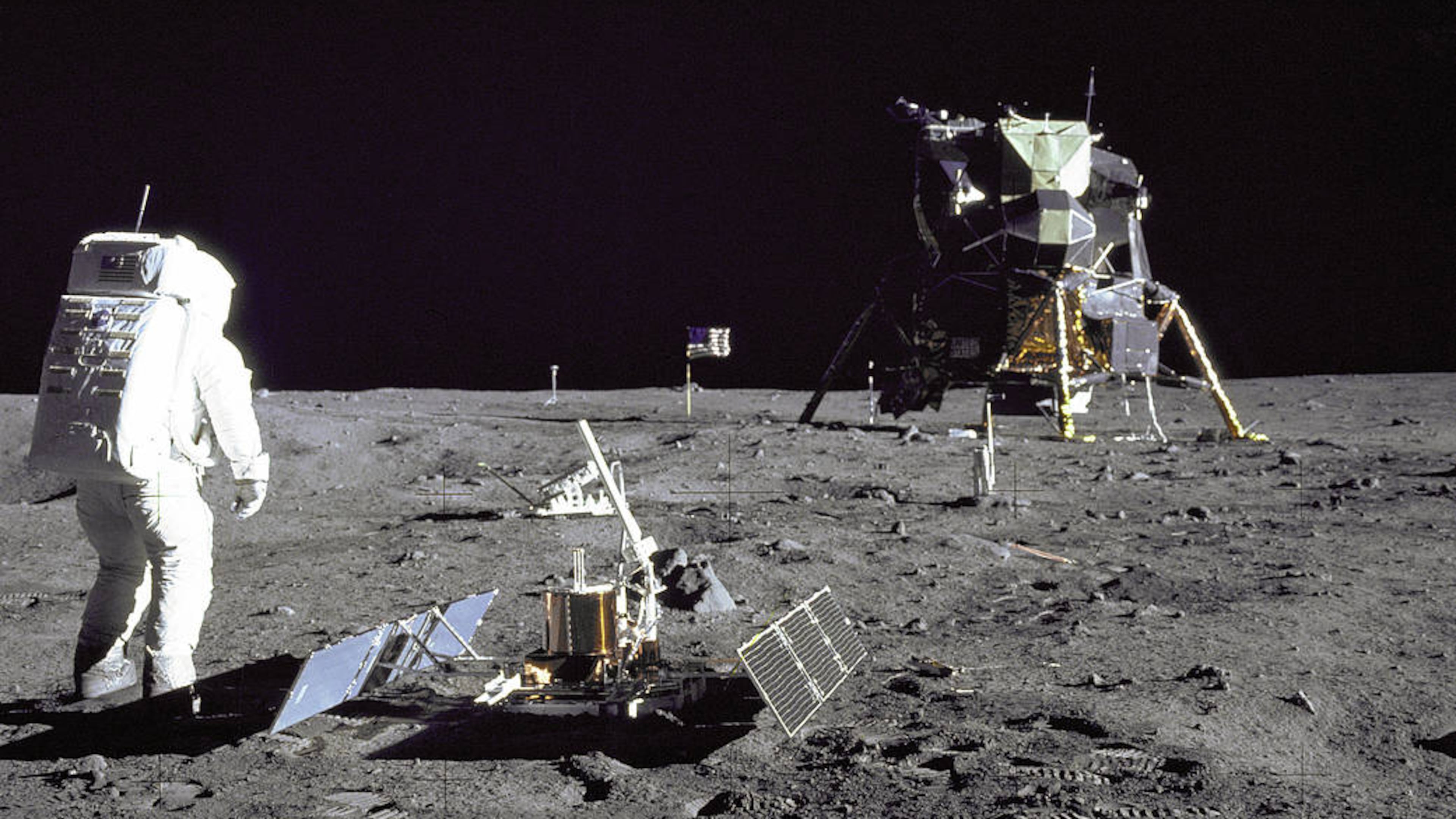 FILE- In this image released by NASA, Astronaut Edwin E. Aldrin Jr., a lunar module pilot, stands on the lunar surface after the Apollo 11 moon landing on July 20, 1969. The Lunar Module is seen in the background. (NASA via AP, File)