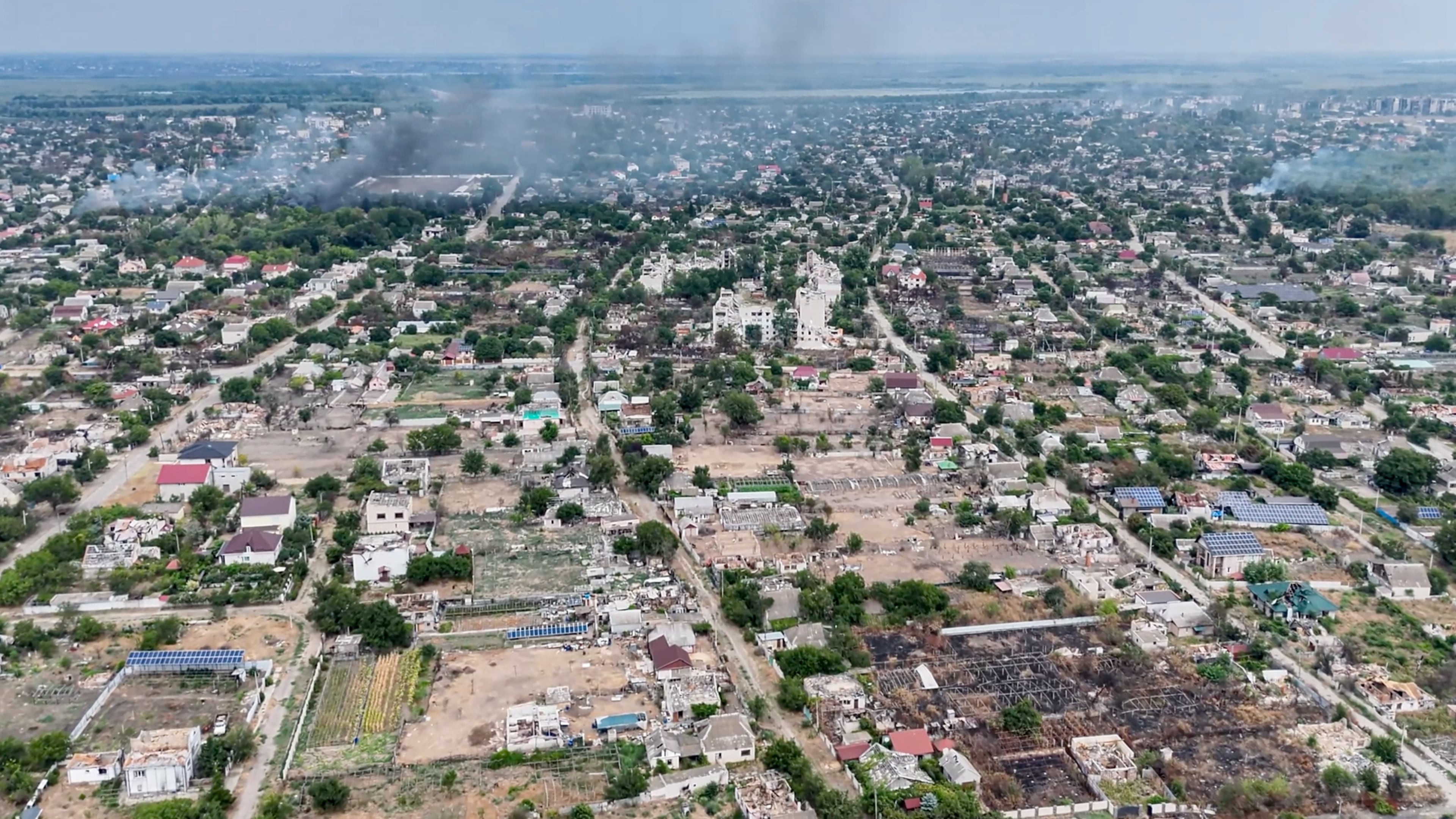 In this undated image from video provided by the Ukrainian 34th Separate Marine Brigade "Borysfen" on Sept. 22, 2026, smoke rises from a residential neighborhood in the Russian-occupied city of Oleshky in the Kherson region of Ukraine. (Ukrainian 34th Separate Marine Brigade "Borysfen" via AP)
