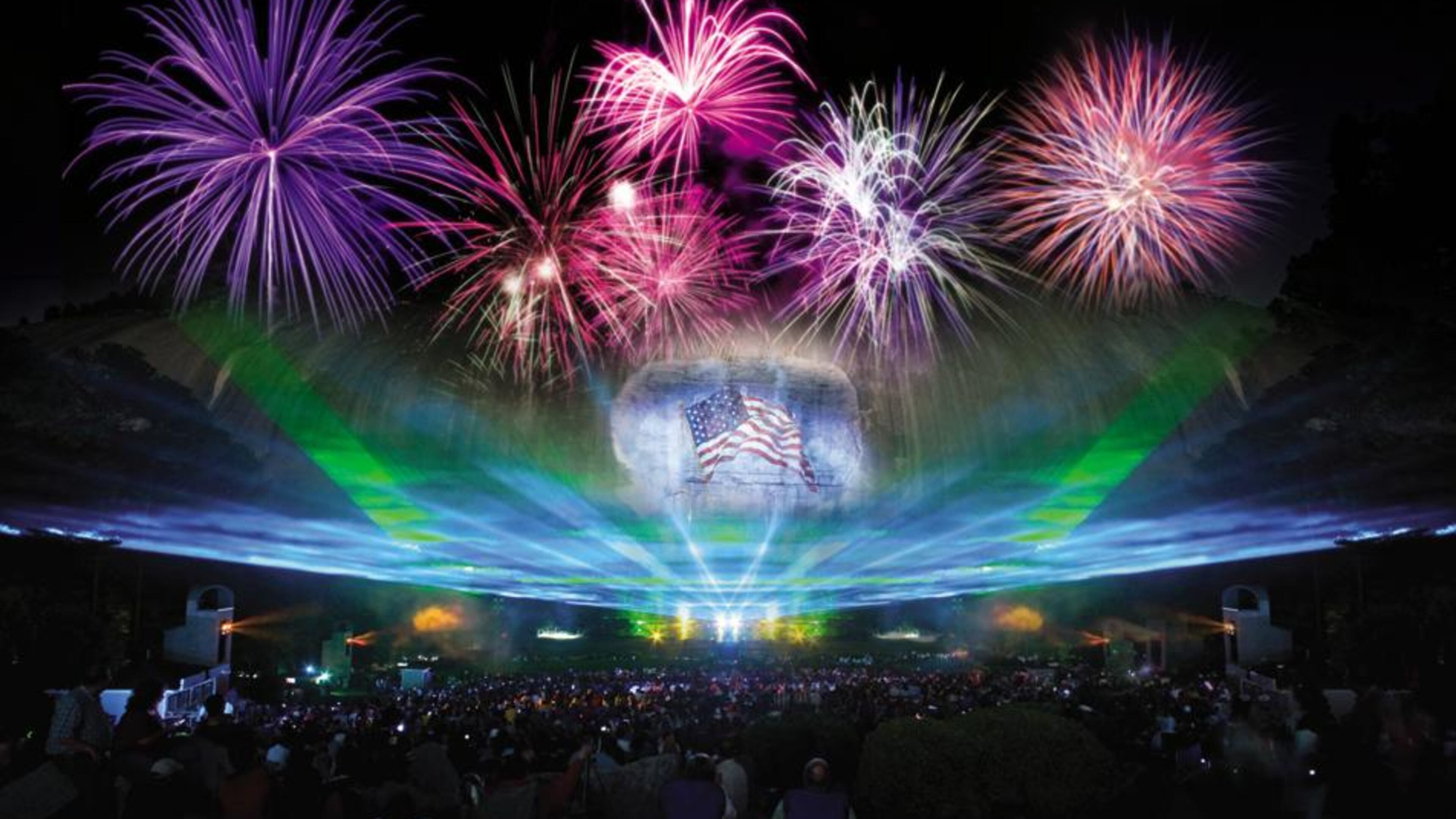 Guests at Stone Mountain Park gather on the massive lawn in front of the mountain for the Lasershow Spectacular in Mountainvision. Photo Credit: Stone Mountain Park.