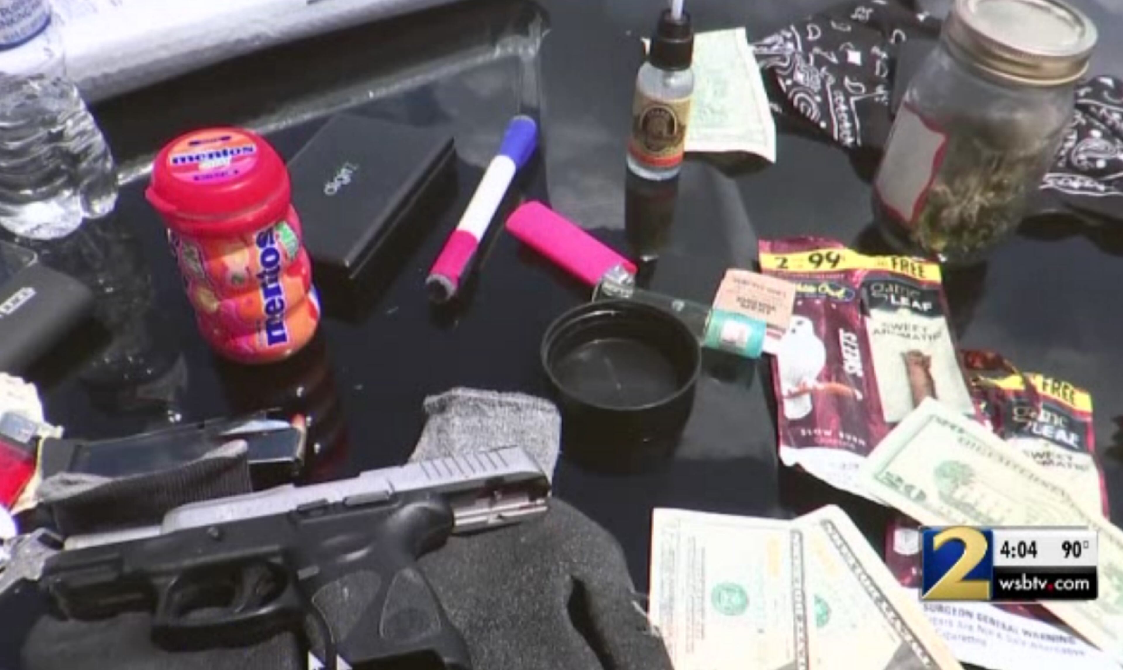Marijuana, a gun and weight scales were allegedly found in Callaway's ice cream truck. (Credit: Channel 2 Action News)
