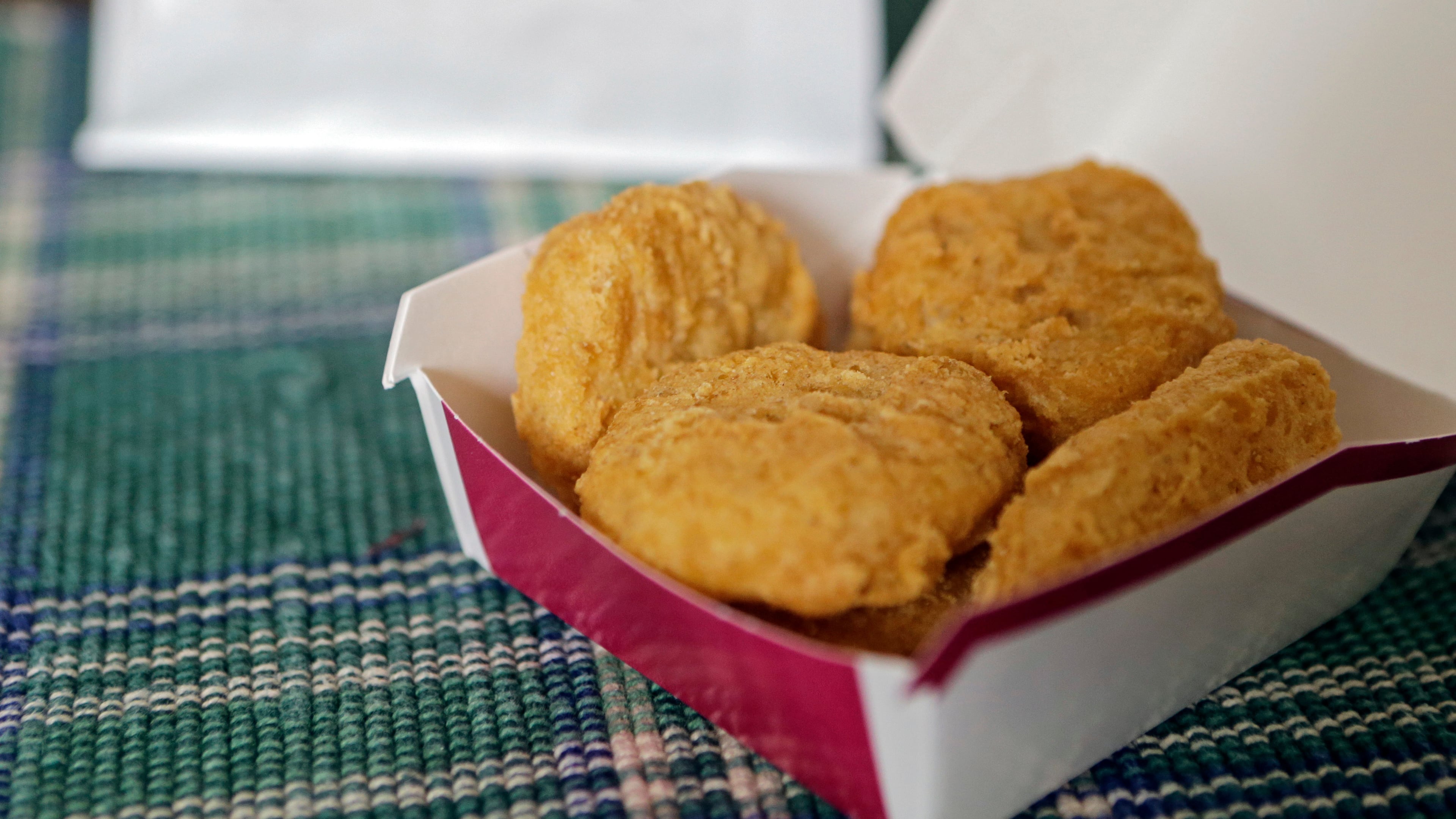 FILE - In this March 4, 2015, file photo, an order of McDonald's Chicken McNuggets is displayed for a photo in Olmsted Falls, Ohio. (AP Photo/Mark Duncan, File)
