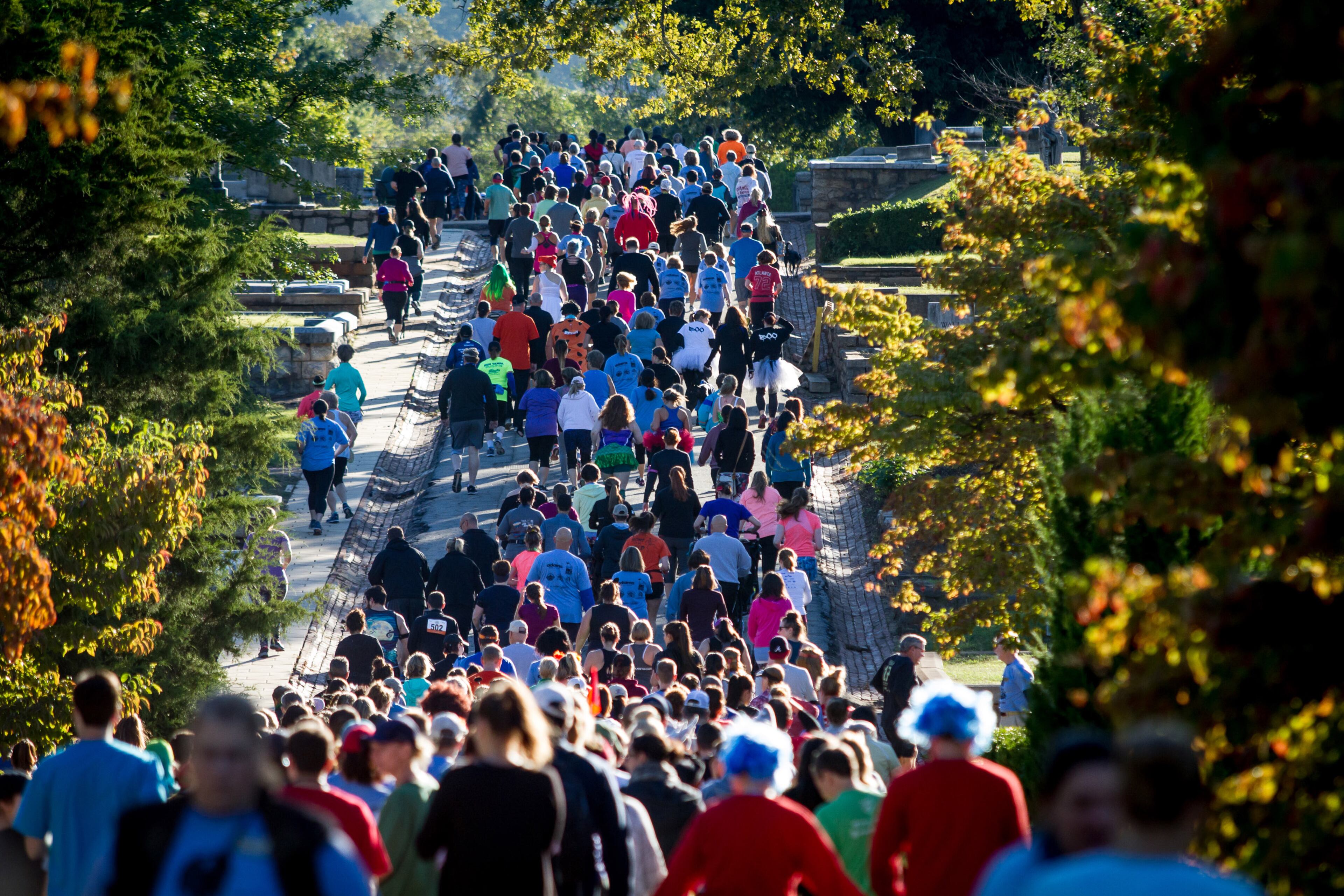 Runners run through Oakland Cemetery during the 11th annual Run Like Hell 5K Saturday, October 13, 2018. All the race proceeds go to the restoration and preservation of the Cemetery. STEVE SCHAEFER / SPECIAL TO THE AJC