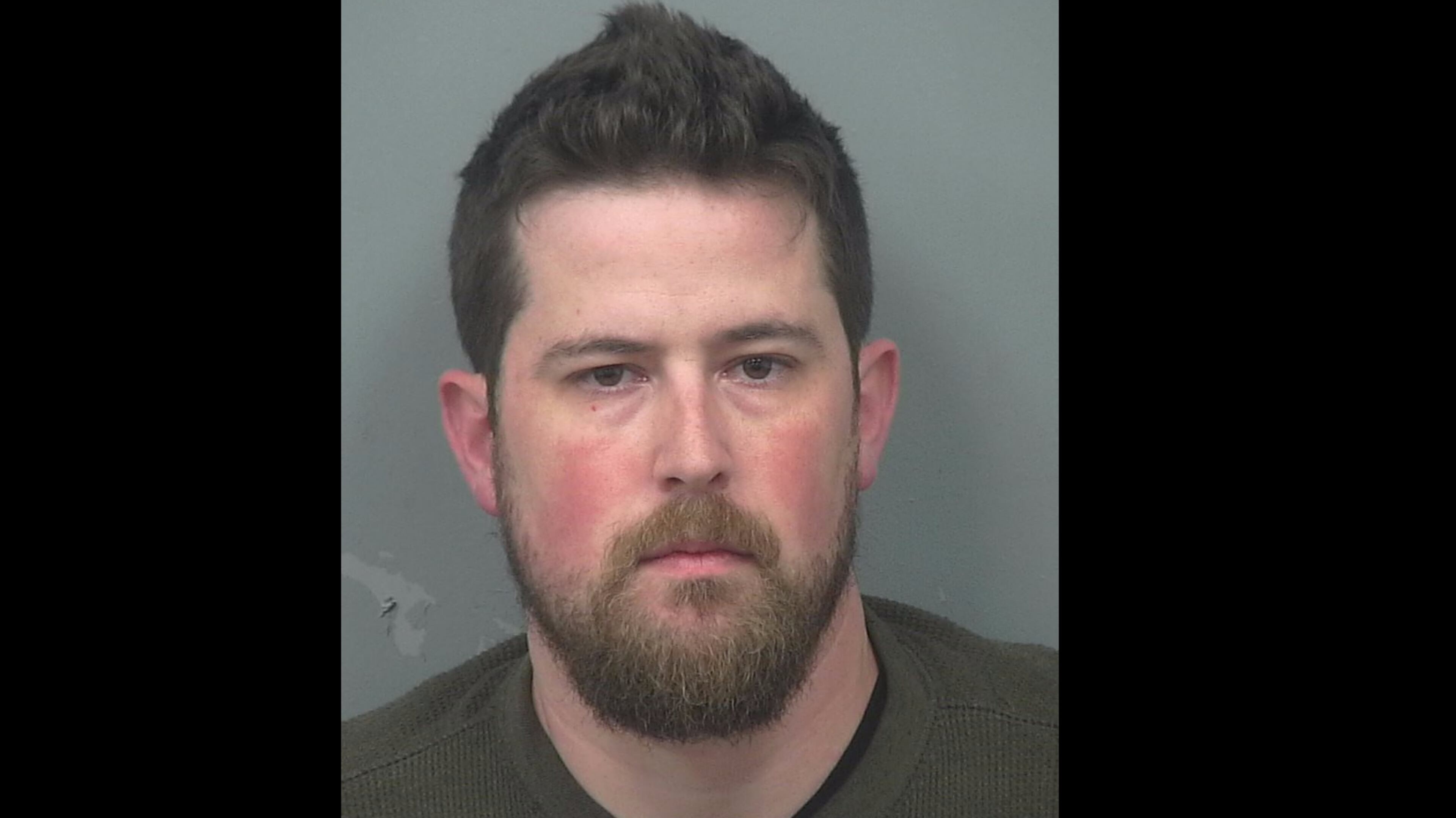 Keri Sean McNaughton, 33, has been charged with terroristic threats and acts after allegedly threatening to shoot his wife in the head.