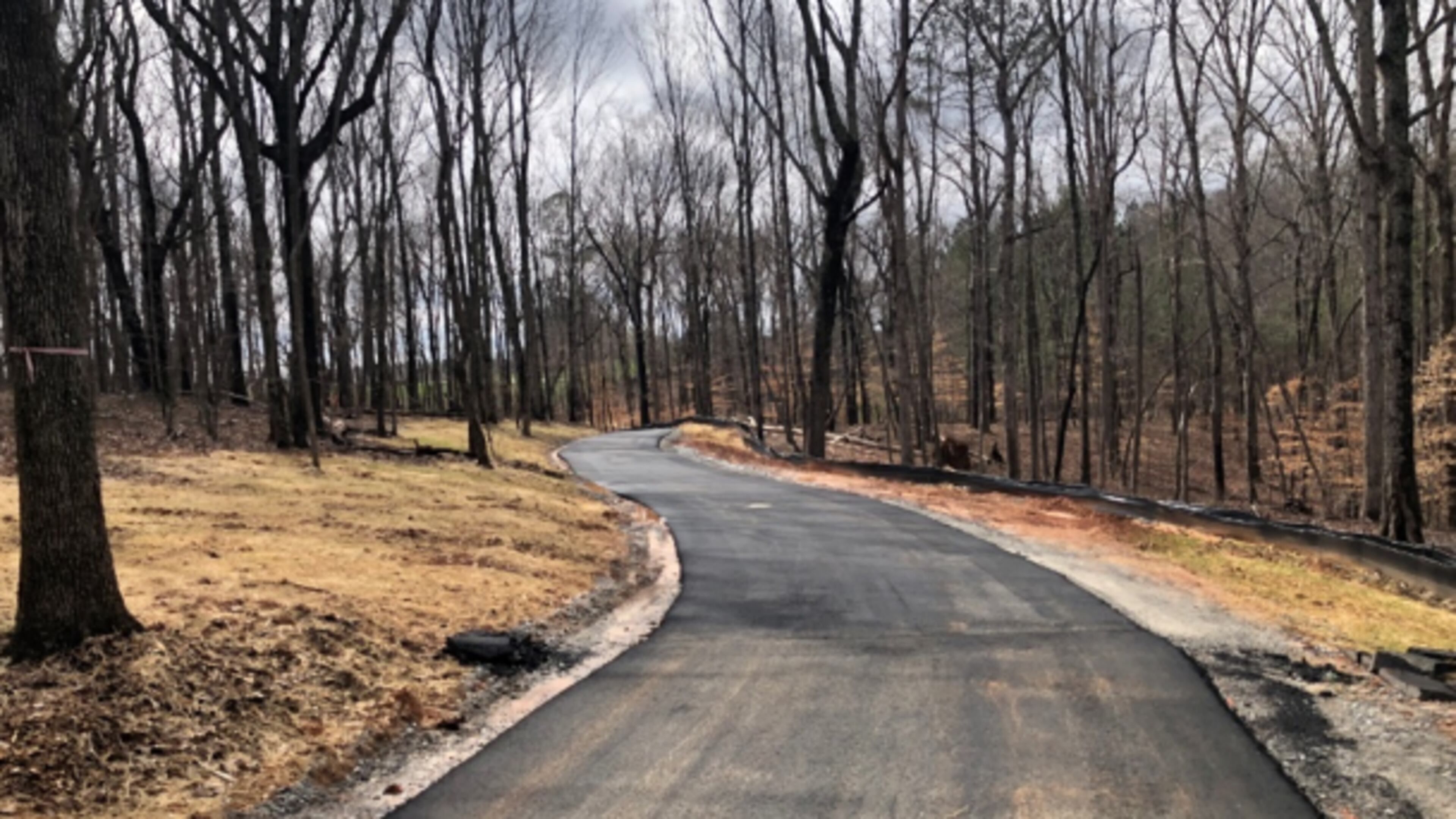 Paving along the segment of Sugar Hill’s Greenway Trail between Peachtree Industrial Boulevard and Level Creek Road has been completed. (Courtesy City of Sugar Hill)