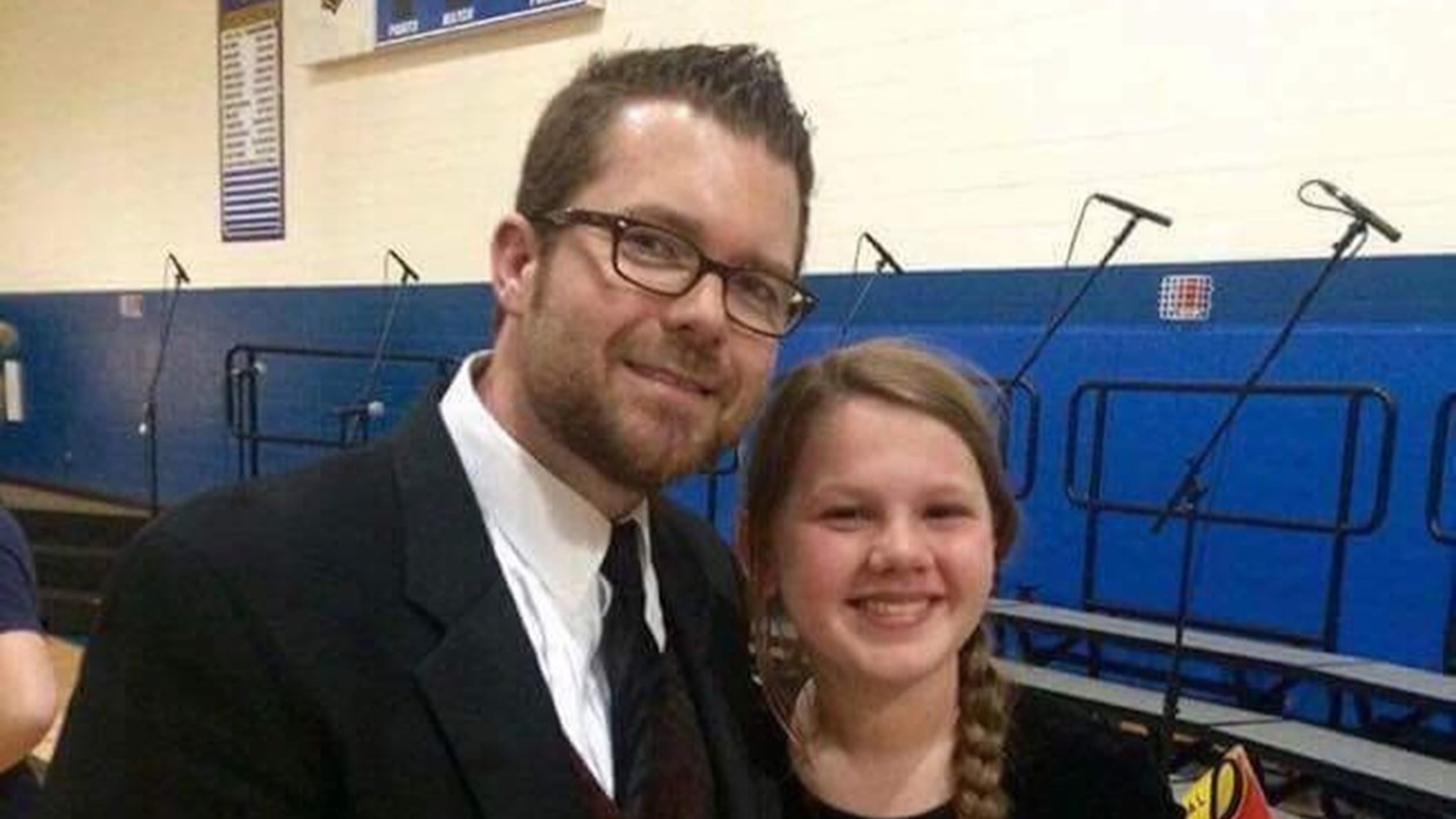 E.T. Booth Middle School chorus teacher Kevin White died in a car accident on March 24. Erin Walsh (right) and other former students of his are selling bracelets and T-shirts to raise money for White’s daughter and wife. CONTRIBUTED BY ERIN WALSH
