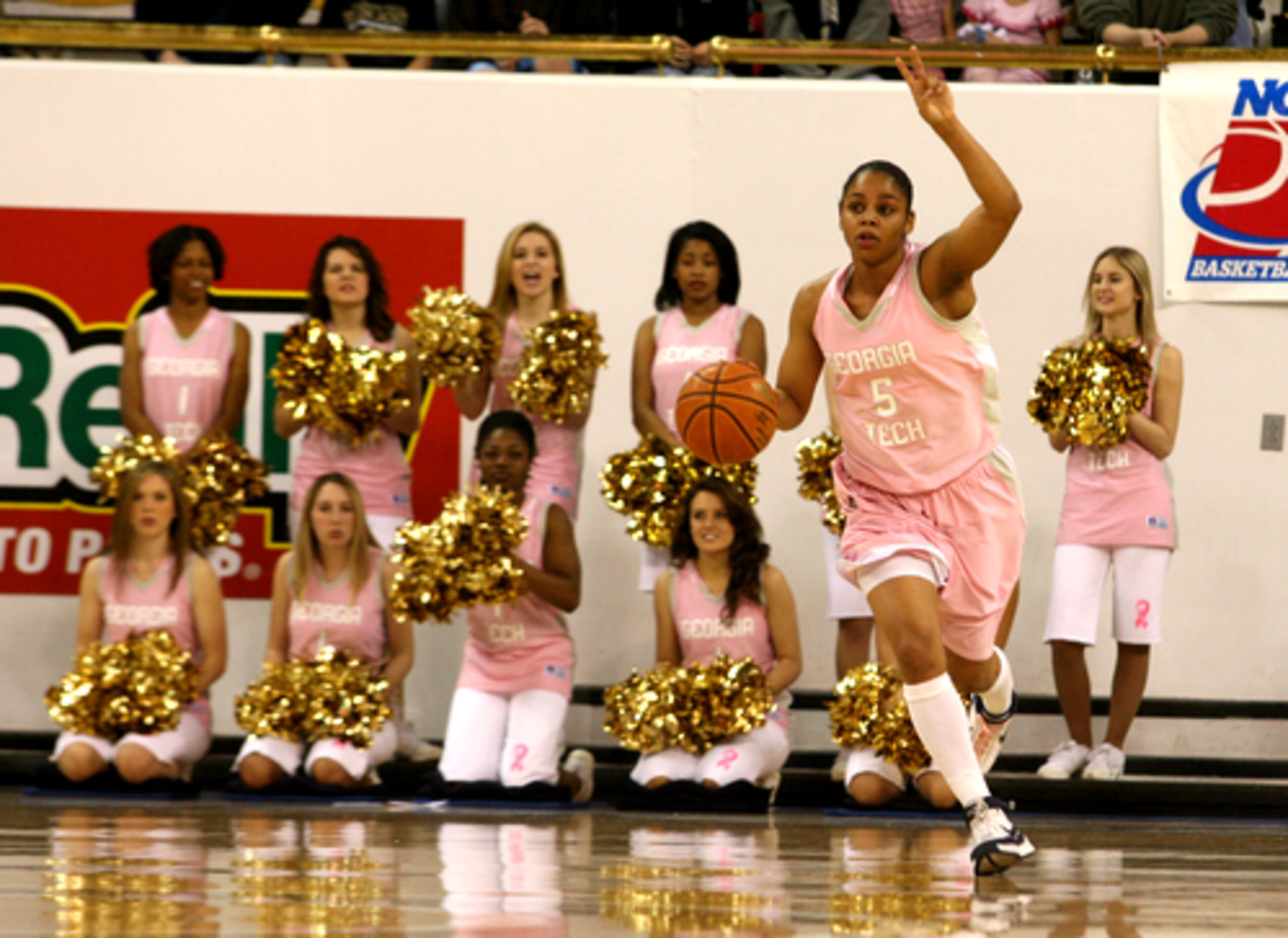 Georgia Tech's Jill Ingram calls a play against North Carolina at Alexander Memorial Coliseum Sunday. Tech players, cheerleaders and fans wore pink to raise awareness about breast cancer. The Lady Jackets lost the game 75-61.