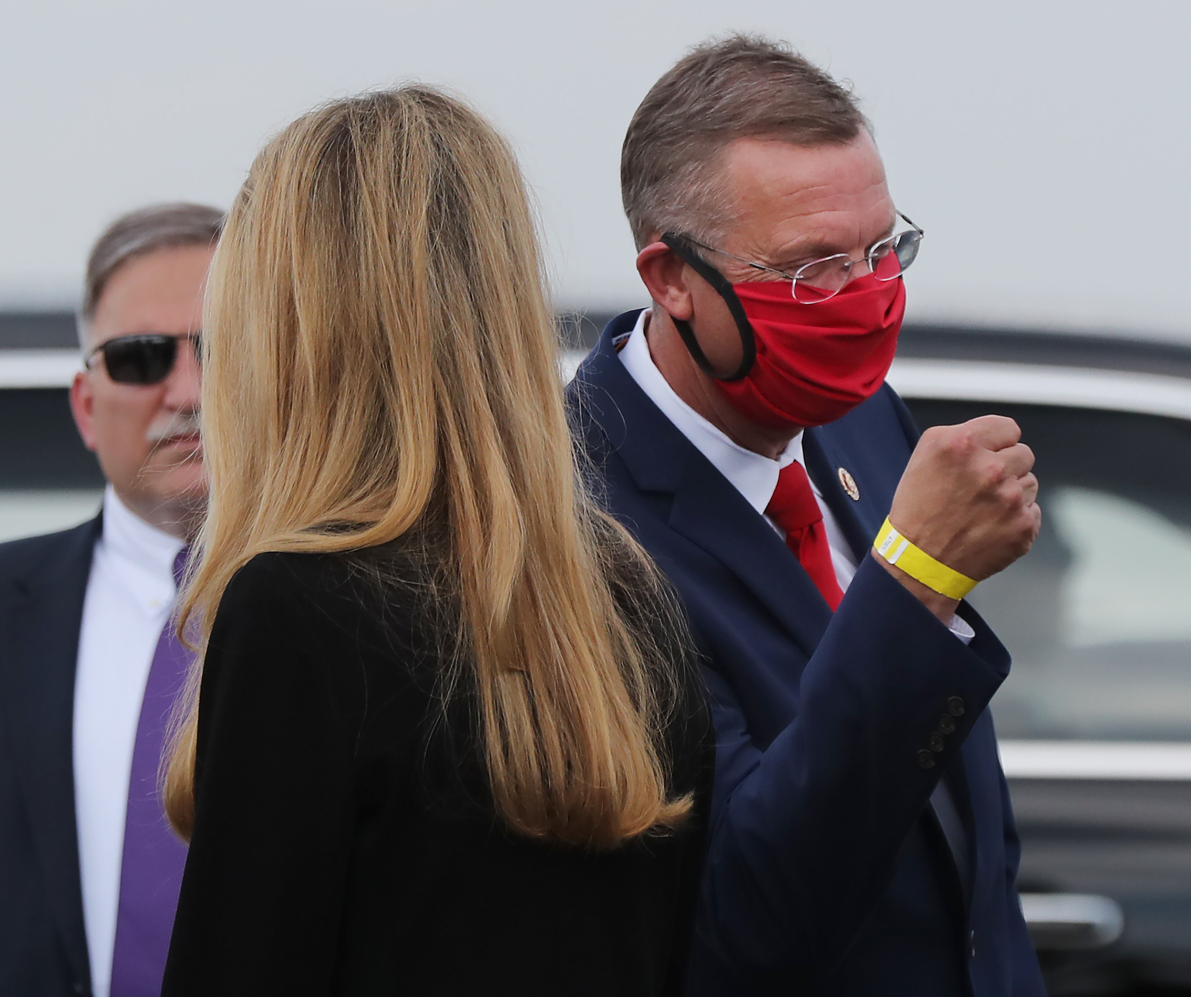071520 Atlanta: Senator Kelly Loeffler (left) passes by her top Republican rival Congressman Doug Collins (right) barely recognizing each other in the greeting line when President Donald Trump arrived to visit Georgia to talk about an infrastructure overhaul at the UPS Hapeville hub at Hartsfield-Jackson International Airport on Wednesday July 15, 2020 in Atlanta. Curtis Compton ccompton@ajc.com