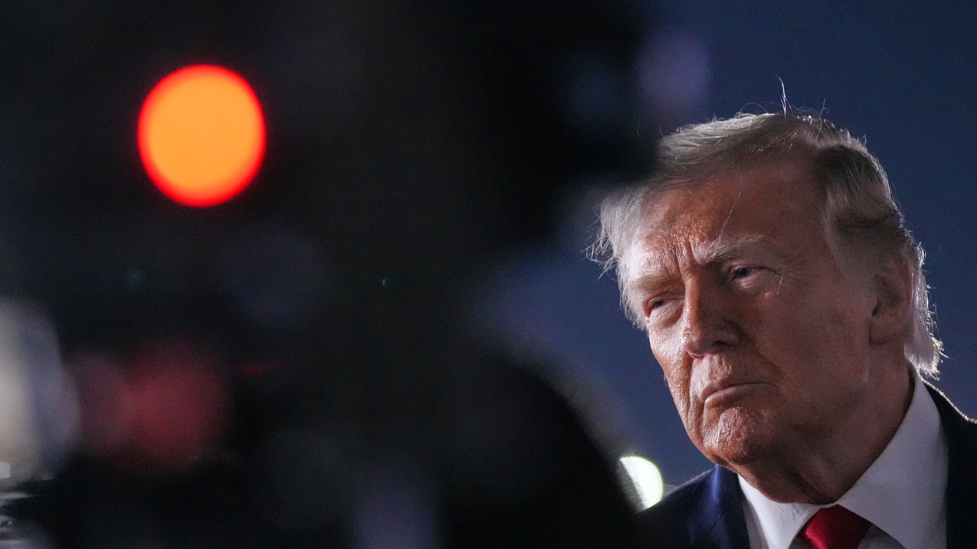 President Donald Trump talks with reporters before boarding Air Force One at John F. Kennedy International Airport in New York, early Tuesday, June 9, 2026. (AP Photo/Mark Schiefelbein)