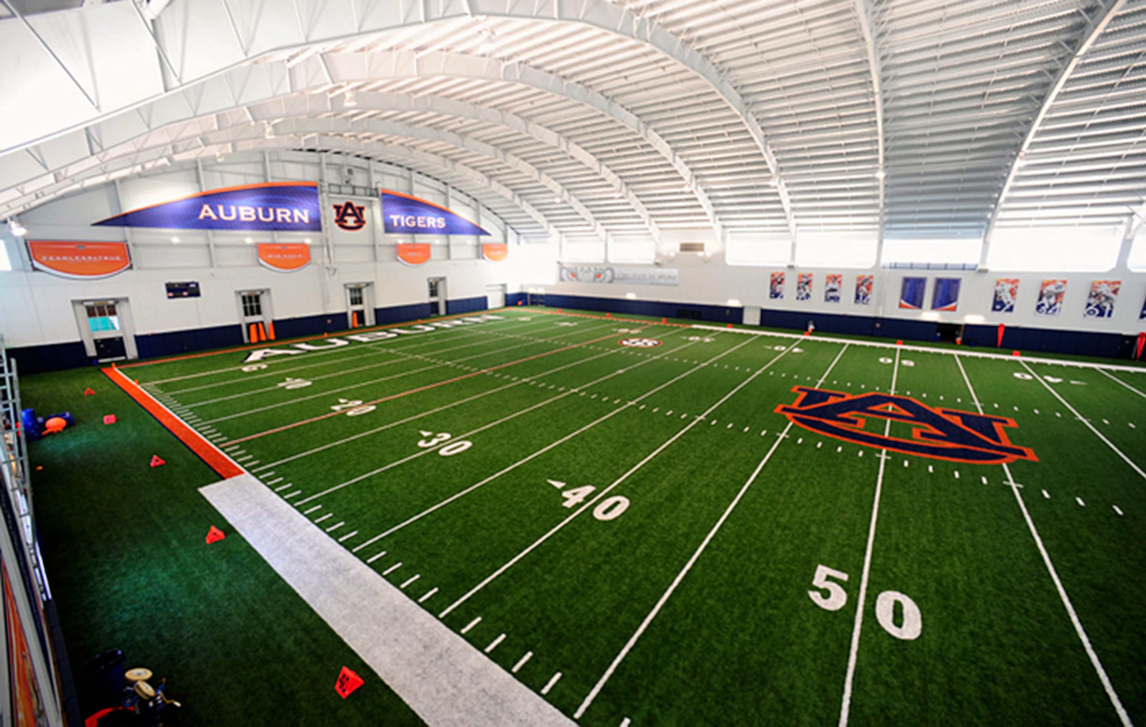 Auburn's 92,000-square-foot multipurpose indoor practice facility features a 100-yard field adjacent to the current football practice fields behind the Auburn Athletic Complex.