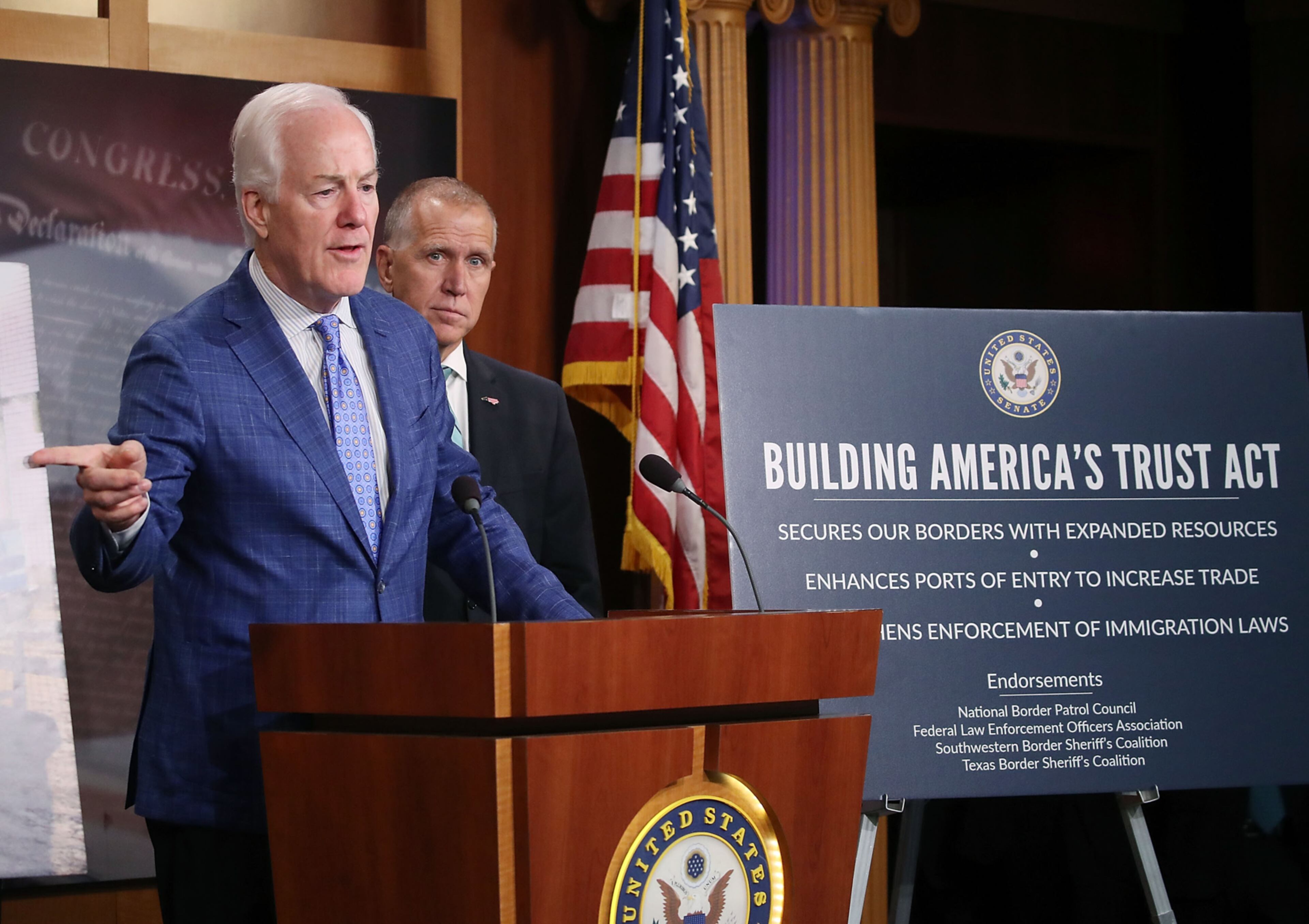 WASHINGTON, DC - AUGUST 03: Senate Majority Whip John Cornyn (R-TX) is flanked by Sen. Thom Tillis (R-NC) while speaking about U.S. border security during a news conference on Capitol Hill, on August 3, 2017 in Washington, DC. (Photo by Mark Wilson/Getty Images)