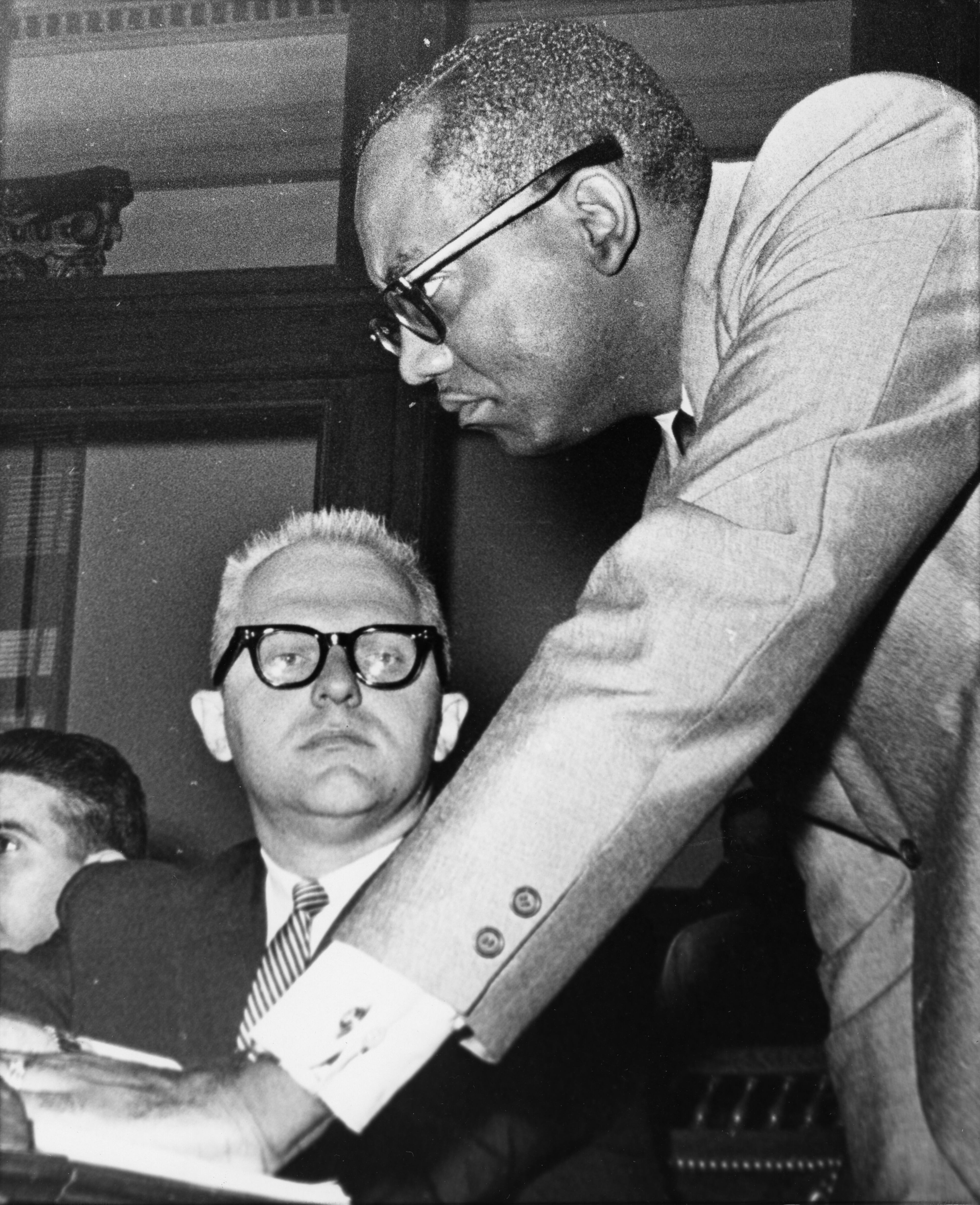 May 28 -- State Sen. LeRoy Johnson, right, confers with colleague Sen. James Wesberry at the State Capitol in Atlanta. The quiet-spoken Johnson was the first African-American elected to the Senate in 92 years.