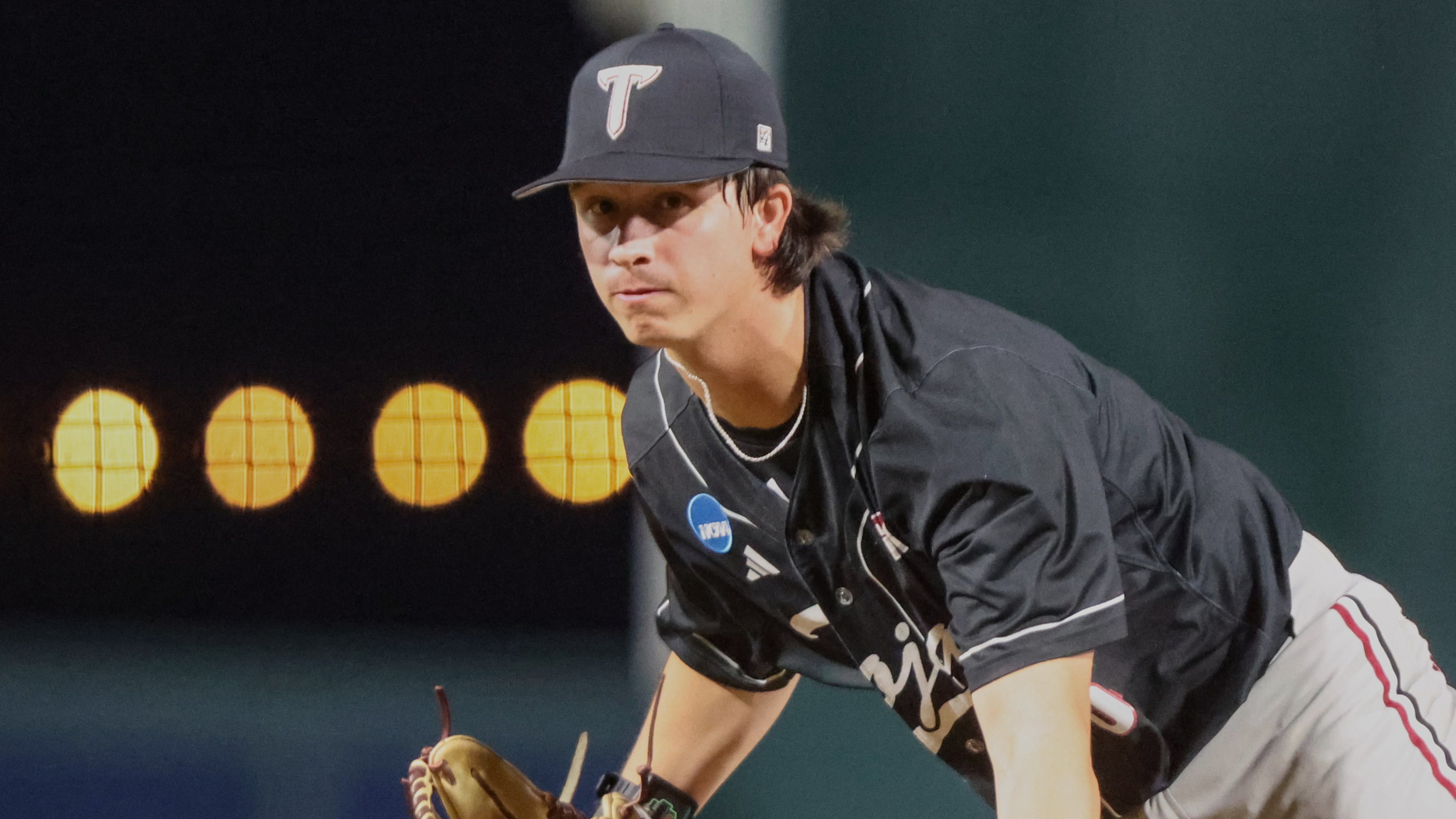 FILE - Troy pitcher Benjamin Stubbs throws during an NCAA regional baseball game against Miami on May 29, 2026, in Gainesville, Fla. (AP Photo/Gary McCullough, File)