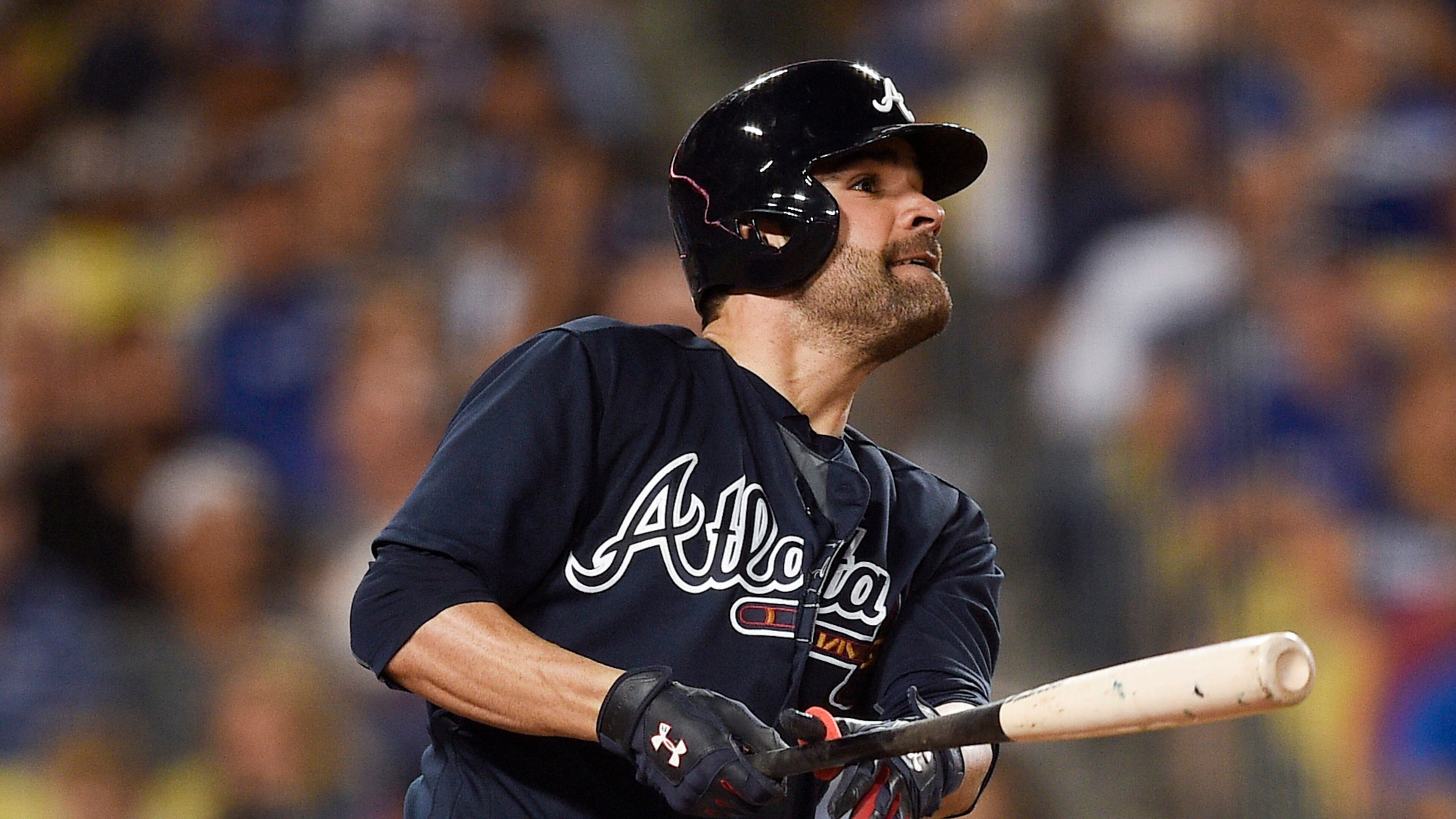 Braves pitcher Jaime Garcia watches his grand slam off Los Angeles Dodgers starting pitcher Alex Wood during the fifth inning in Los Angeles, Friday, July 21, 2017. (AP Photo/Kelvin Kuo)