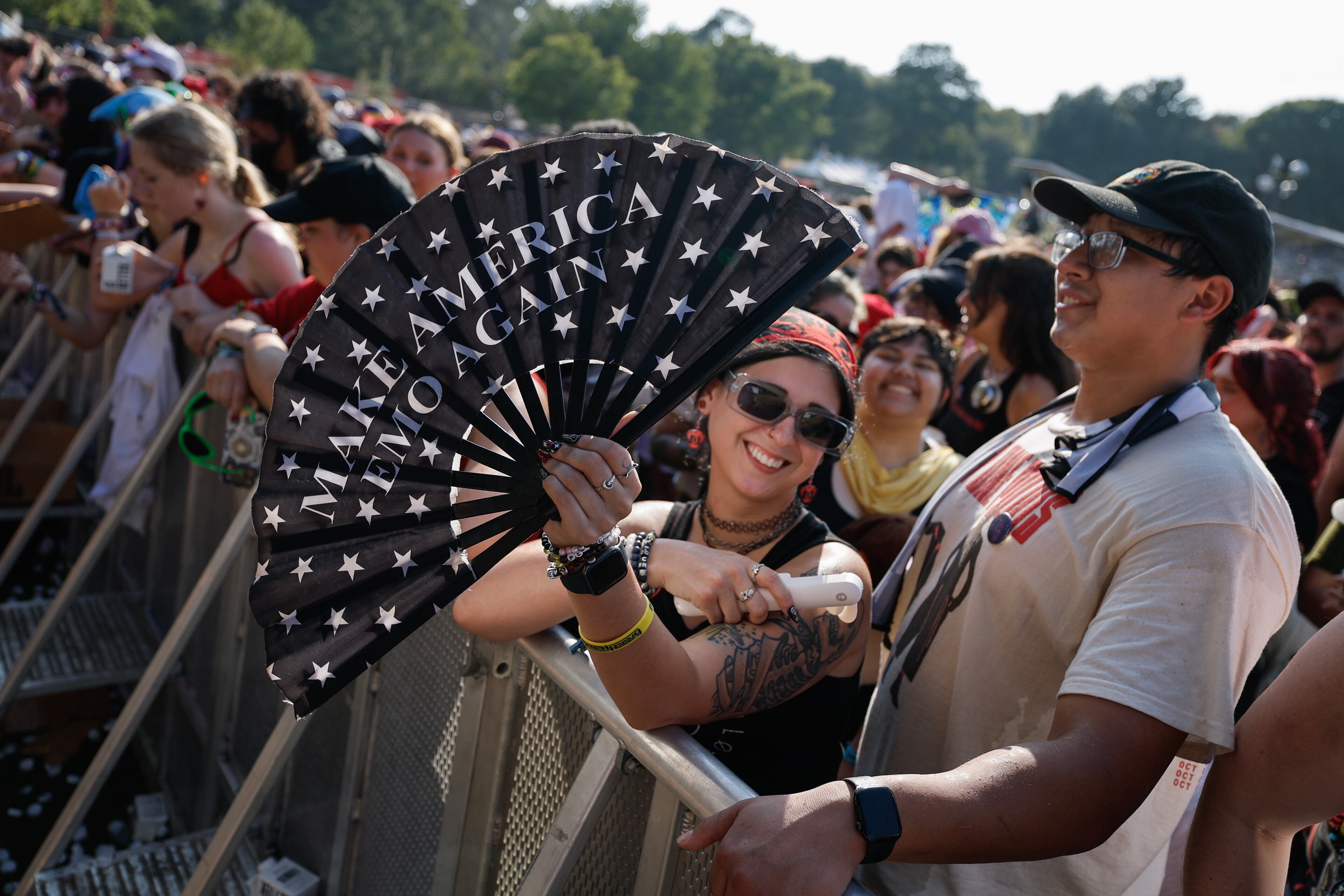 Fans try to keep cool as Peach Pit performs during the Shaky Knees music festival at Piedmont Park, Saturday, Sept. 19, 2026, in Atlanta. (Erik S. Lesser for the AJC)