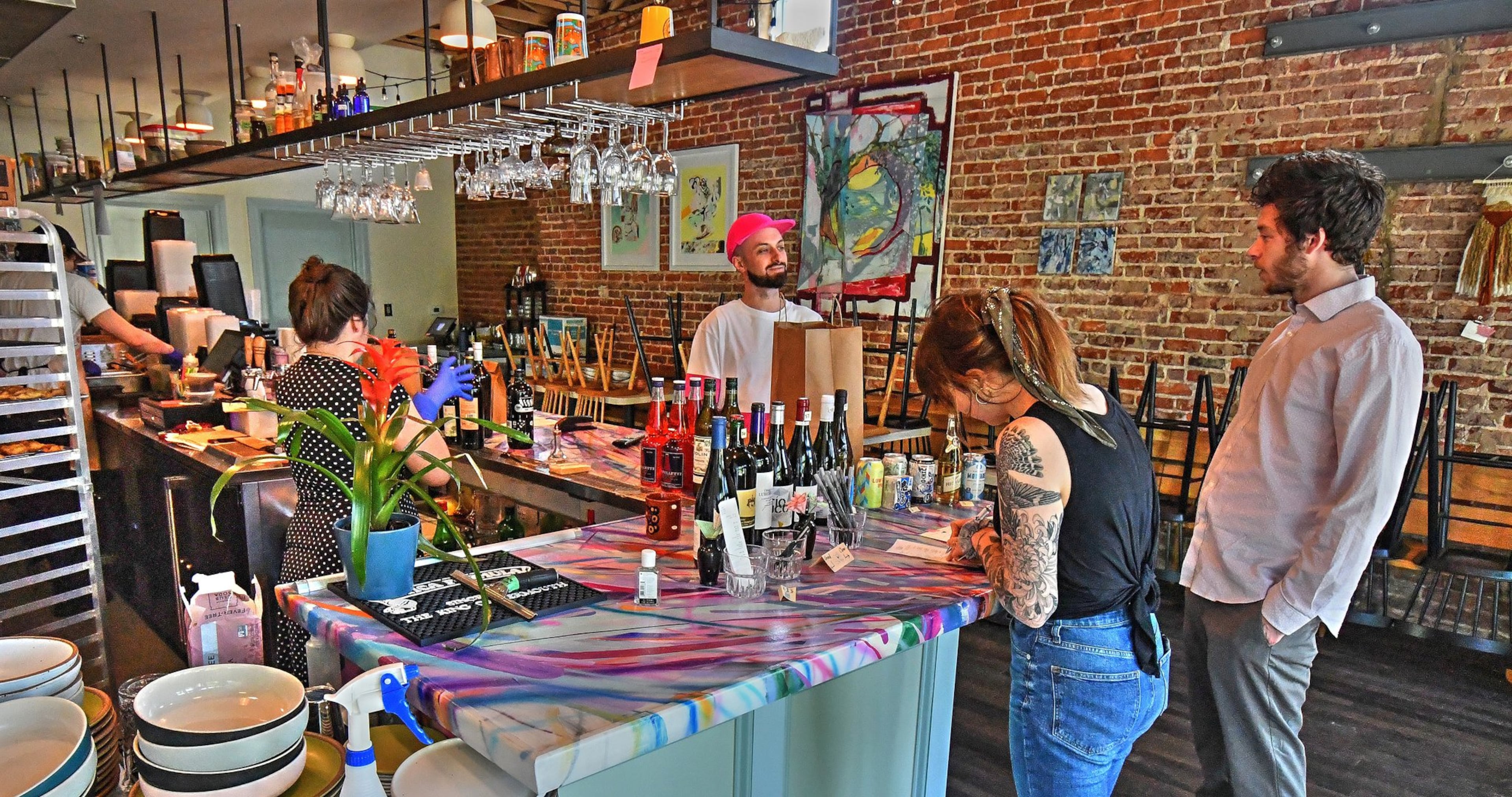 Customers picking up orders at Little Bear. CONTRIBUTED BY CHRIS HUNT PHOTOGRAPHY