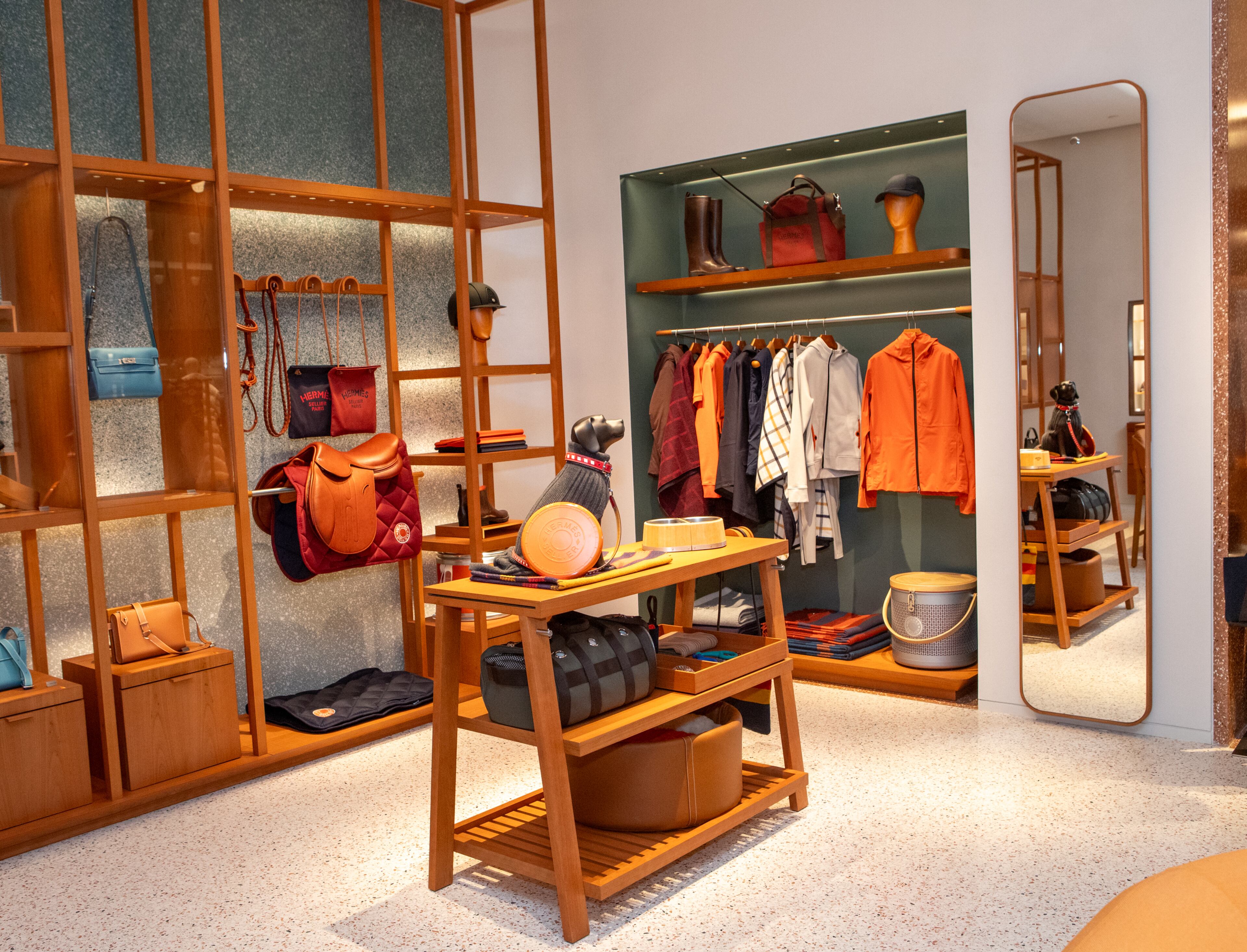 Hermès opens at Phipps Plaza after a decade in Buckhead Village District. The new space is nearly twice as large and is organized into 16 areas, including the métiers for shoes, flanked by men and women’s ready-to-wear areas and the fine jewelry and watches salon. The French boutique offers luxury goods, cosmetics, silk scarves, handbags, jewelry, fine shoes, perfumes, home good and equestrian leathers. Photos taken on Wednesday, Oct 30, 2024. (Jenni Girtman for The Atlanta Journal-Constitution)