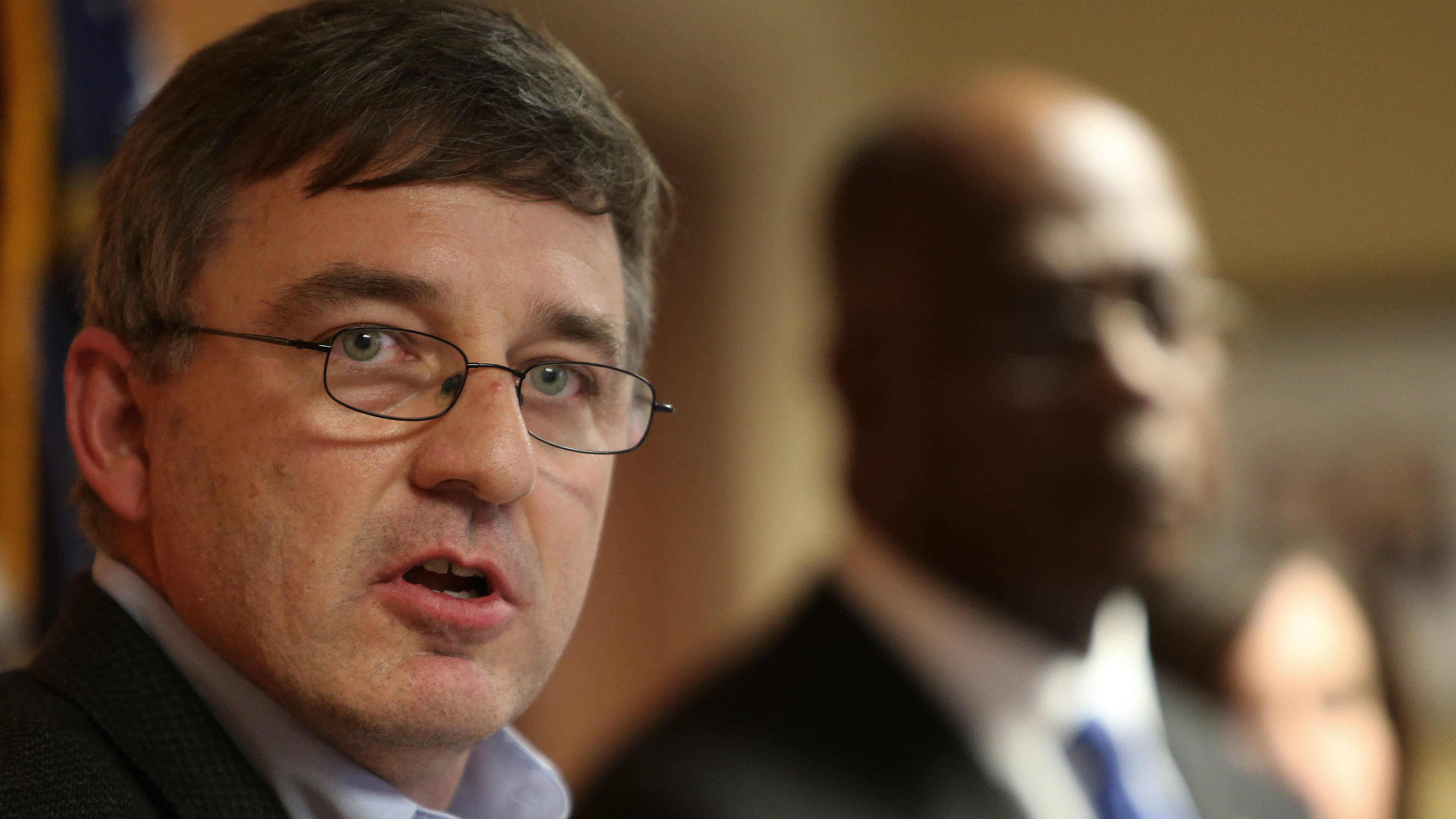 Gillen Young, foreman of the Fulton County Grand Jury November/December 2013 term, speaks about the investigation into the Fulton Jail and school system the grand jury undertook during a Thursday afternoon January 9, 2014 press conference in downtown Atlanta. Fulton County District Attorney Paul Howard, right, and other members of the grand jury also spoke about their findings.