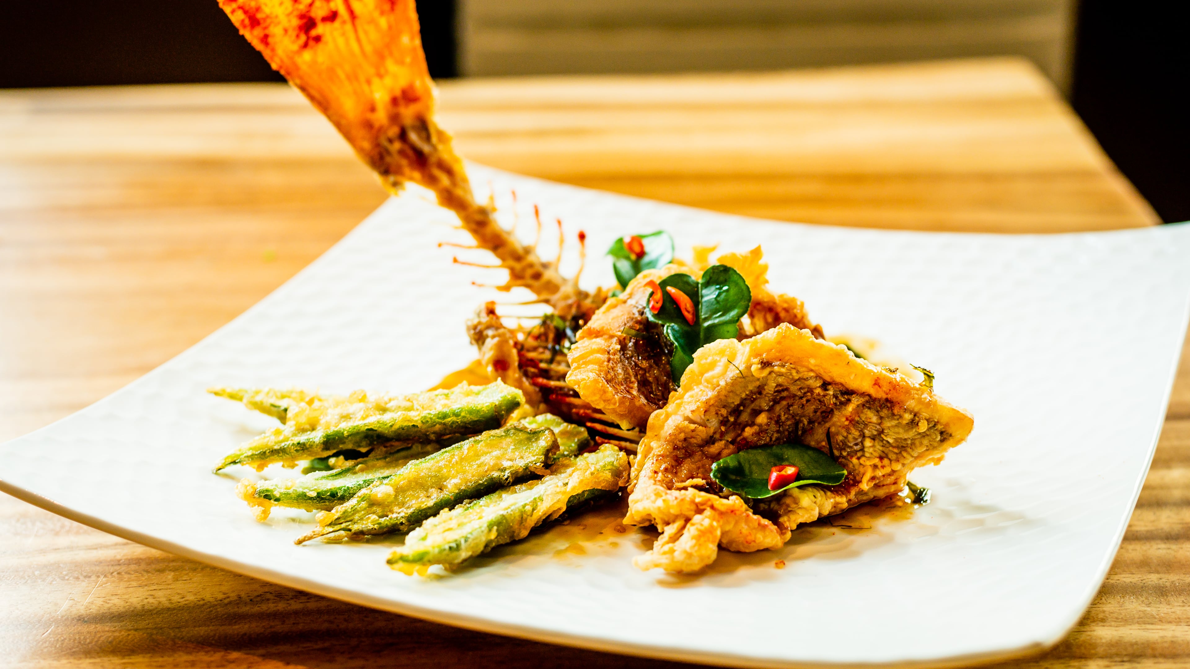 The pla kra pow, or snapper basil, at Chai Yo Modern Thai tastes good and has a visual wow factor.