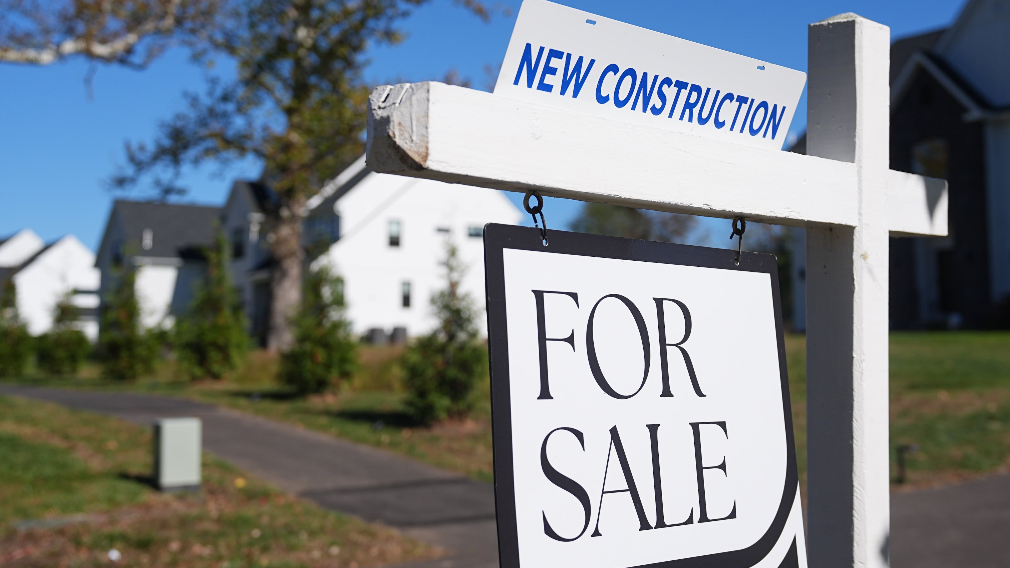 FILE - A sign is posted for a new home for sale in Ambler, Pa., Oct. 16, 2025. (AP Photo/Matt Rourke, File)