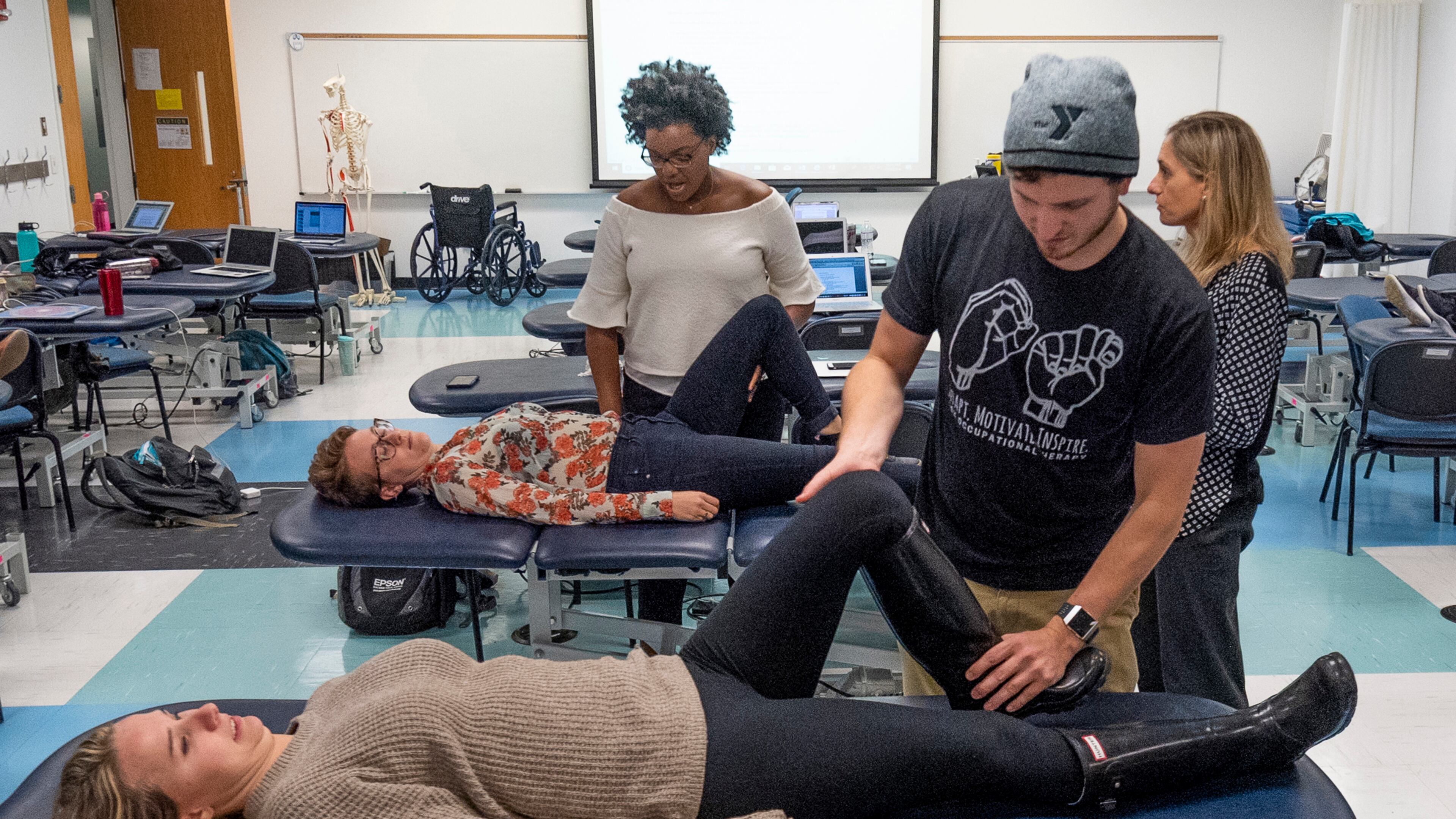 Students in Georgia State University's occupational therapy master's program work on restoring functions to help patients return to normal activities.