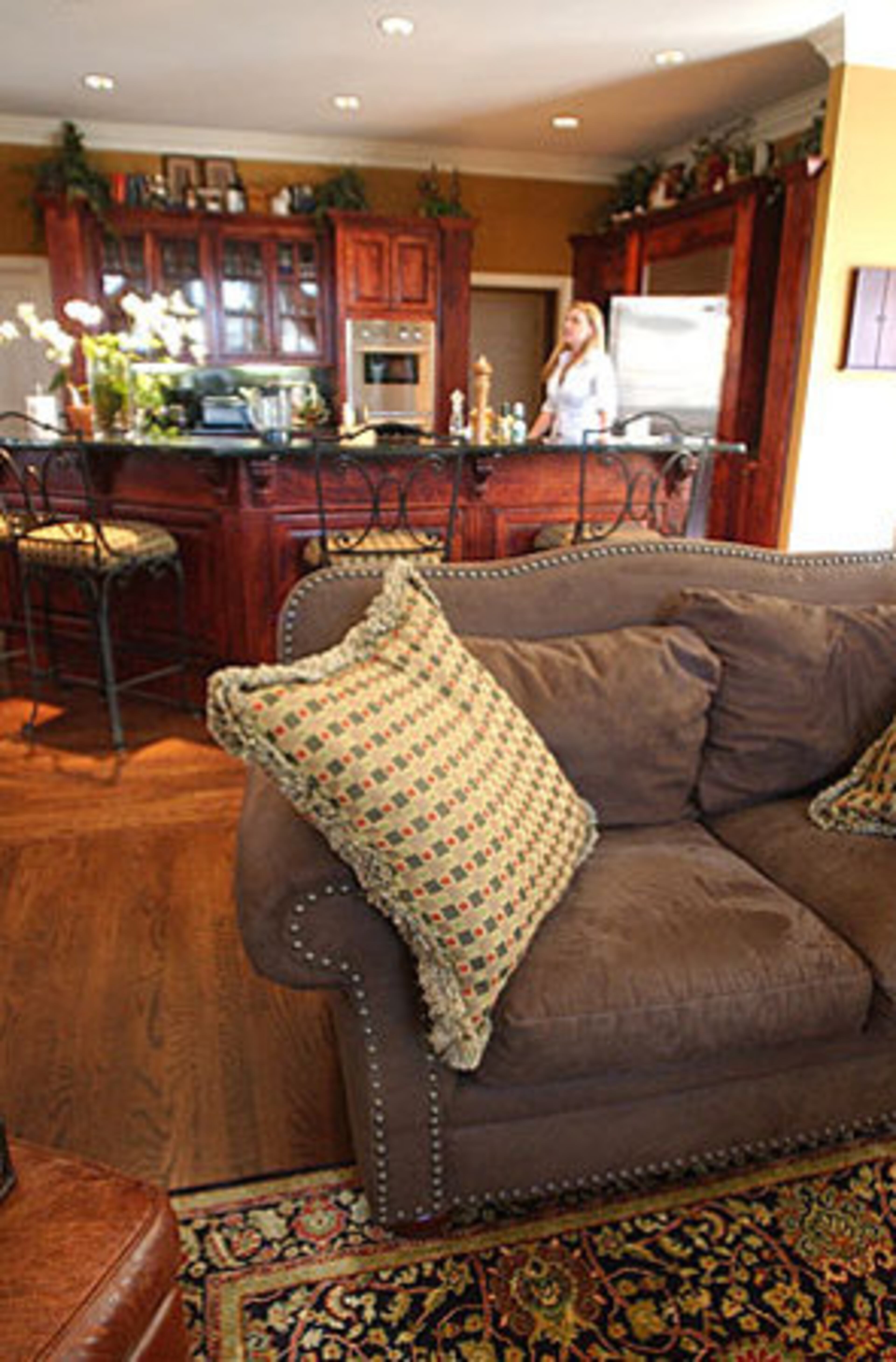 The keeping room flows naturally into the kitchen with its cherry-colored cabinets. Taylor has been doing charity work, hoping that if she is unable to pay the fine authorities will allow her to work it off through community service.