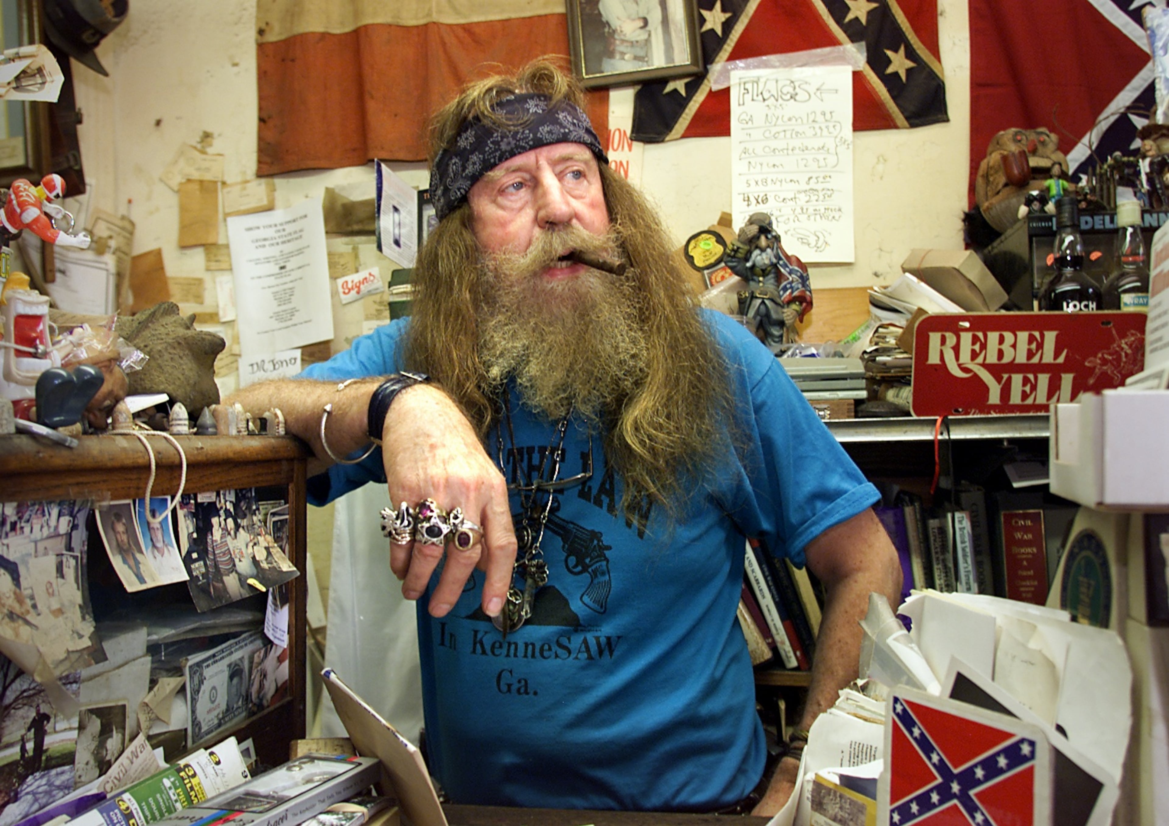 Dent 'Wildman' Myers, pictured at 70, owned a Civil War surplus/antique shop, full of Confederate memorabilia, artifacts from Nazi Germany and items depicting Black people using the worst kinds of racial stereotypes. (Katie King/AJC FILE)