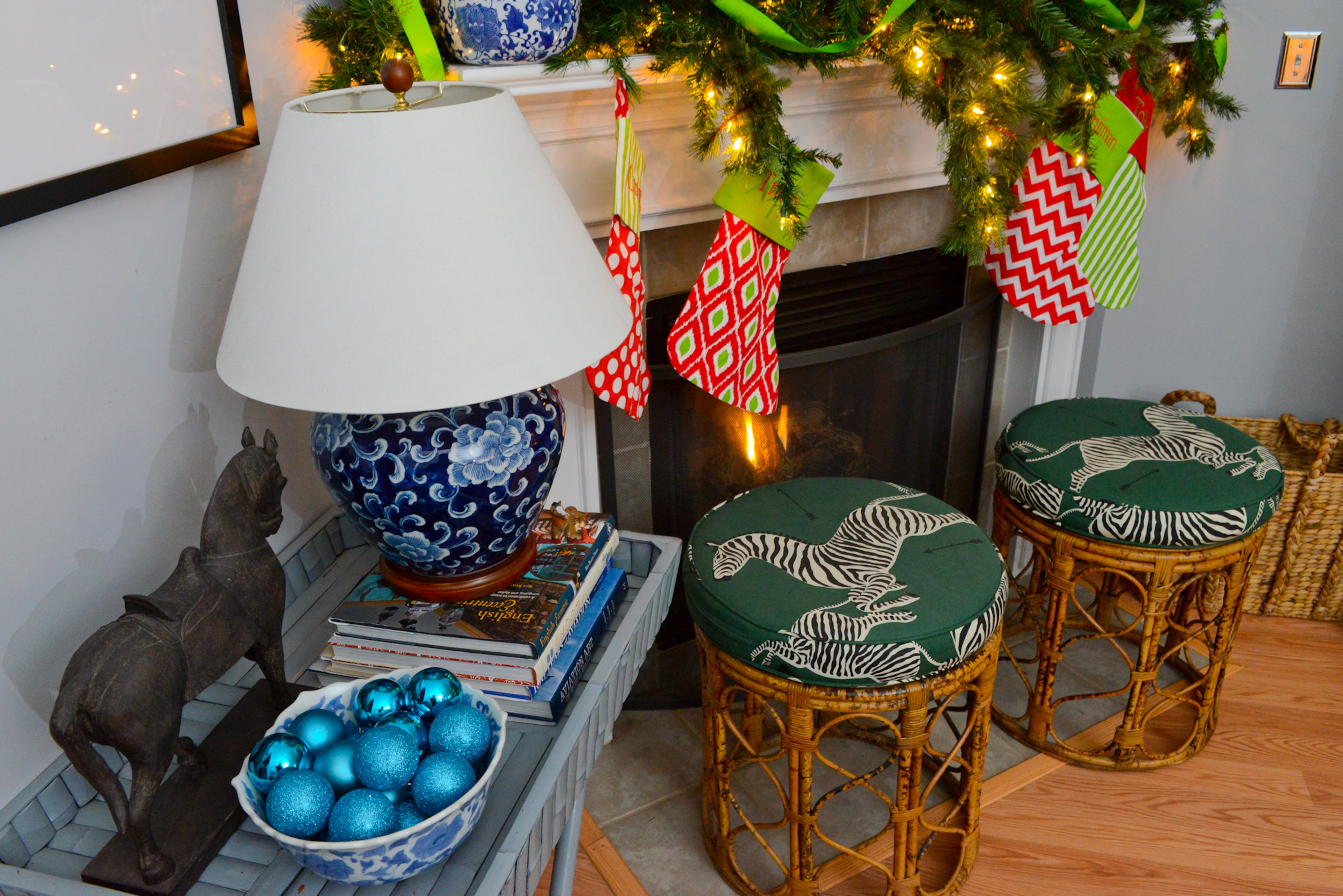 Travis Snyder's favorite furniture in the Union City home he shares with Craig Cowan is the pair of vintage rattan stools in front of the living room fireplace. "They're topped with a classic Scalamandre print fabric - classic, pretty and a real wow feature in a pretty neutral room, " he says. "I found the stools on Craigslist, which is also a great. The Scalamandre fabric is iconic."