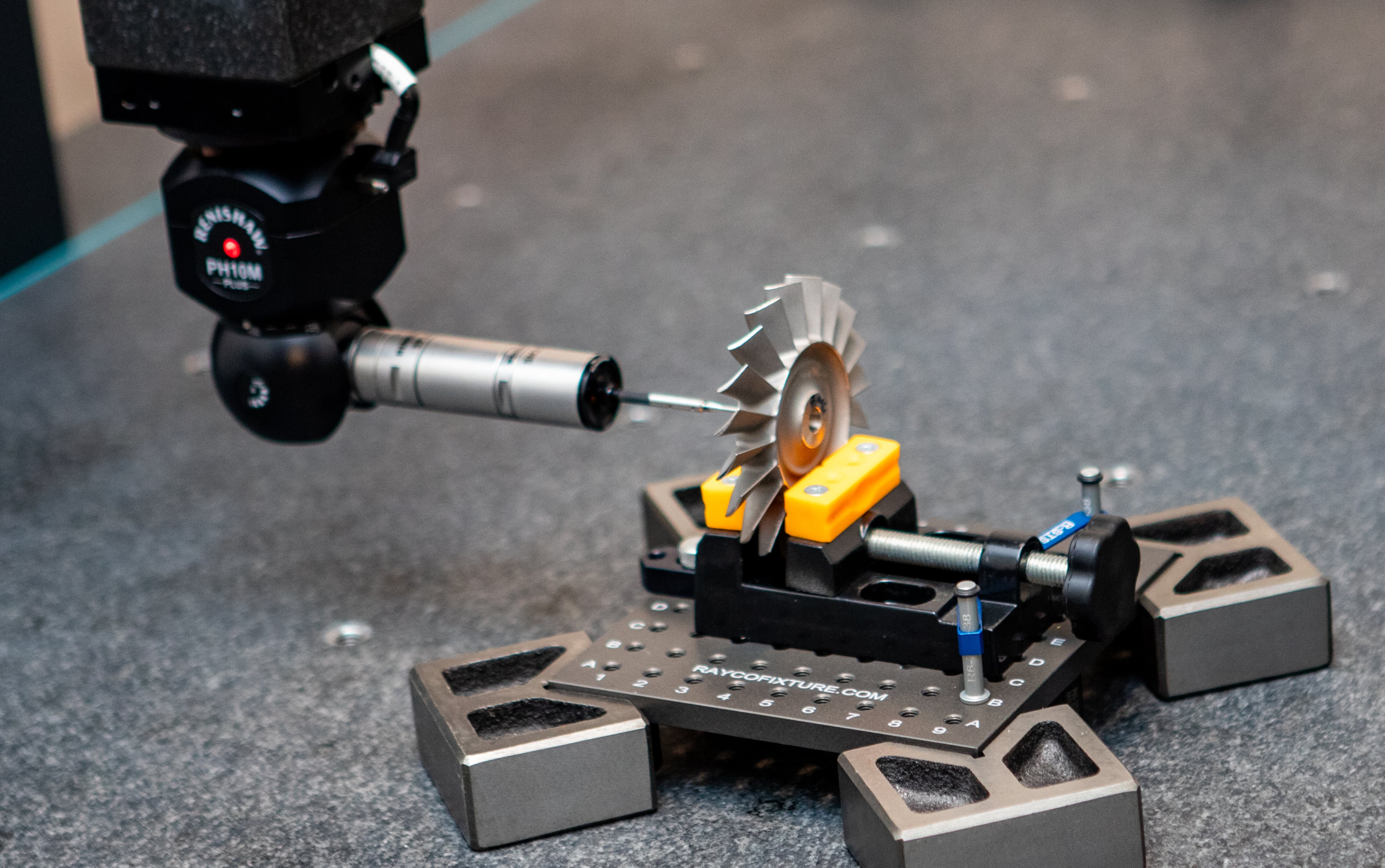 Engineers use a precision measuring machine to troubleshoot and perform quality control analysis on products made at PBS Aerospace's Roswell facility on Wednesday, Aug. 27, 2025. (Jenni Girtman for The Atlanta Journal-Constitution)
