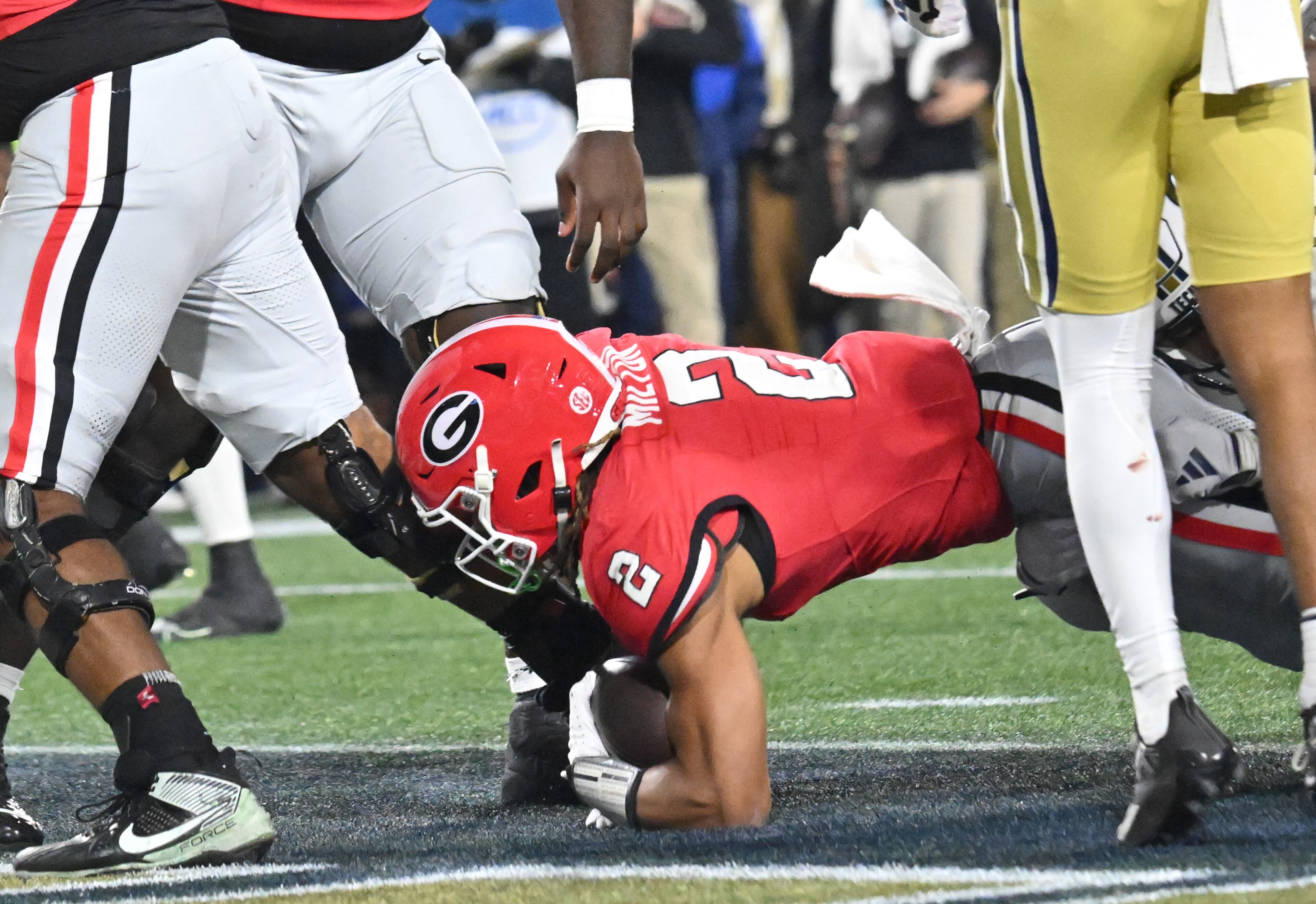 Georgia running back Kendall Milton (2) scores a touchdown during the first half of an NCAA college football game at Georgia Tech's Bobby Dodd Stadium, Saturday, November 25, 2023, in Atlanta. (Hyosub Shin / Hyosub.Shin@ajc.com)