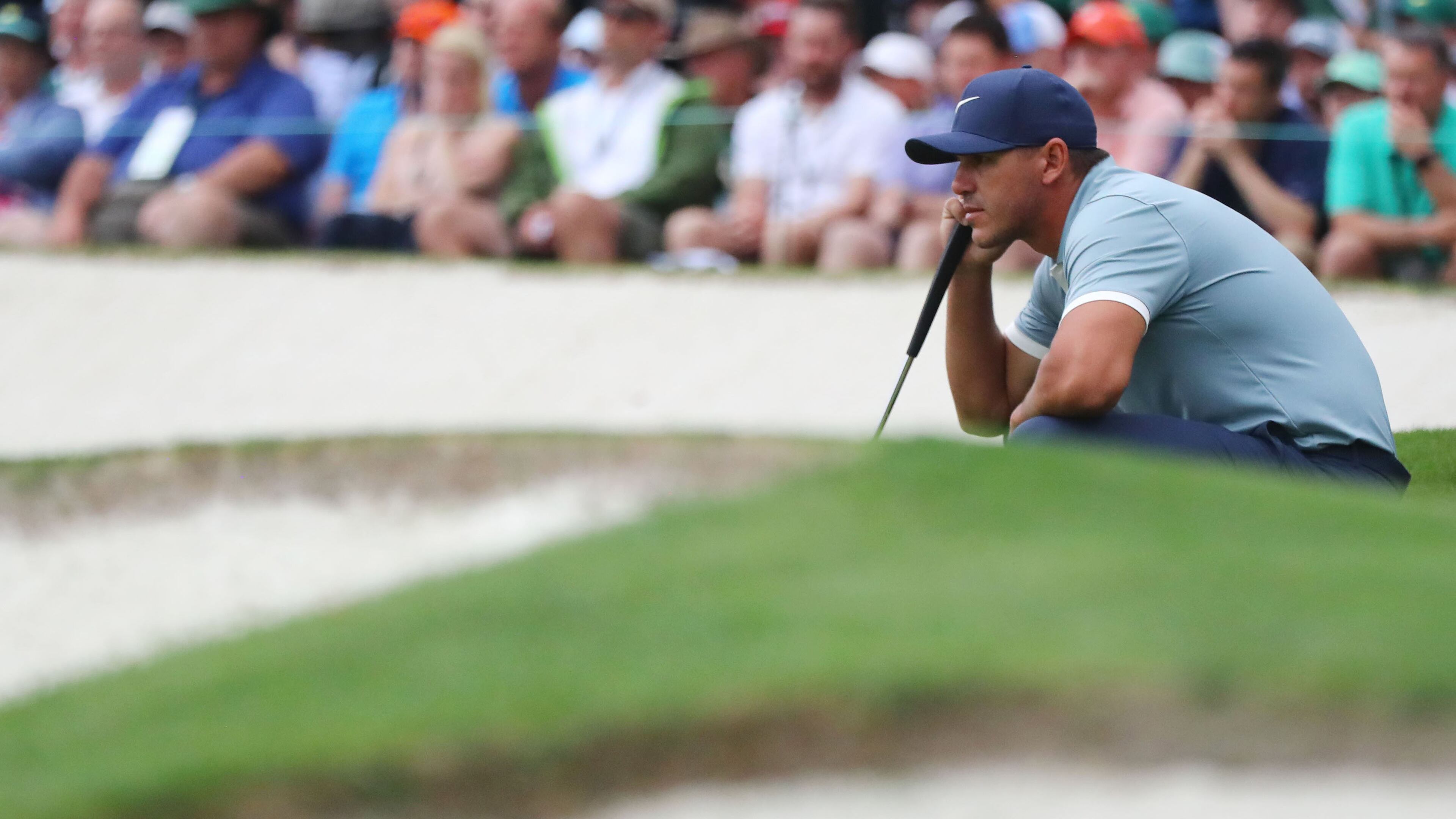 Brooks Koepka lines up his putt on 7 during the final round of the Masters Sunday, April 14, 2019, at Augusta National Golf Club in Augusta.