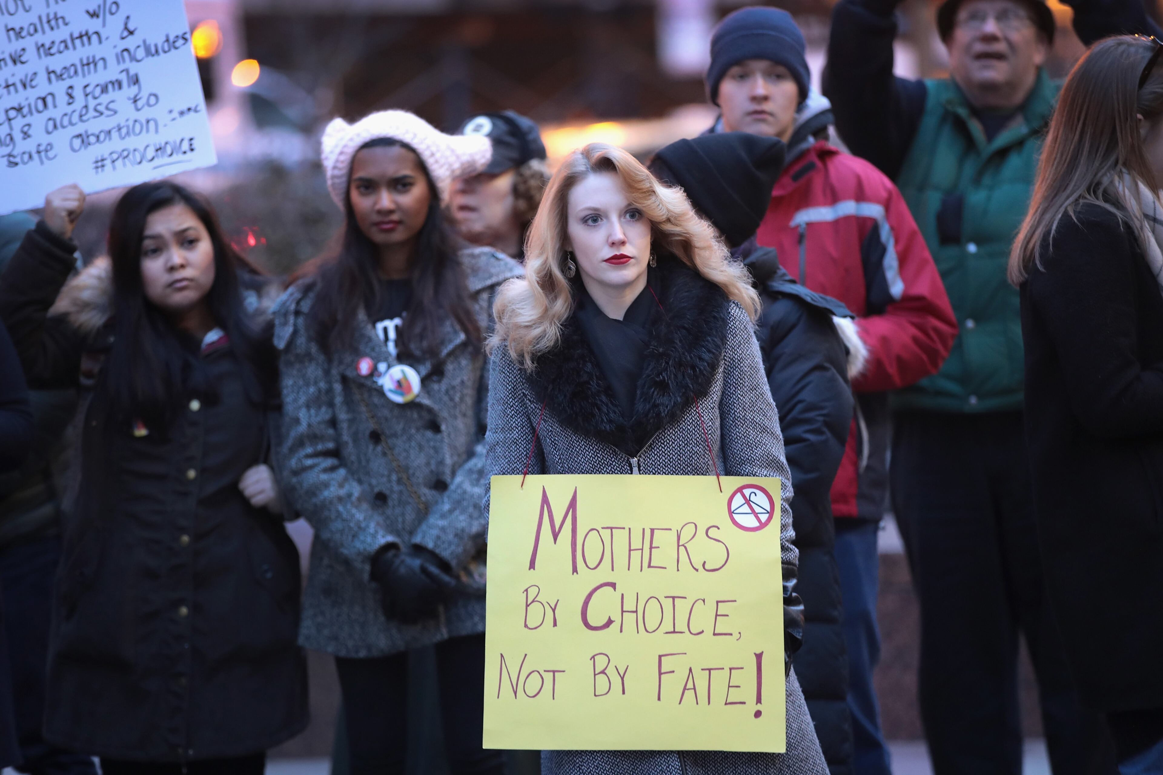CHICAGO, IL - FEBRUARY 10: Demonstrators protest in front of the Thompson Center to voice their support for Planned Parenthood and reproductive rights on February 10, 2017 in Chicago, Illinois. On February 11, rallies are scheduled to be held outside of Planned Parenthood clinics nationwide to call on Congress and President Trump to pull federal funding from Planned Parenthood. (Photo by Scott Olson/Getty Images)