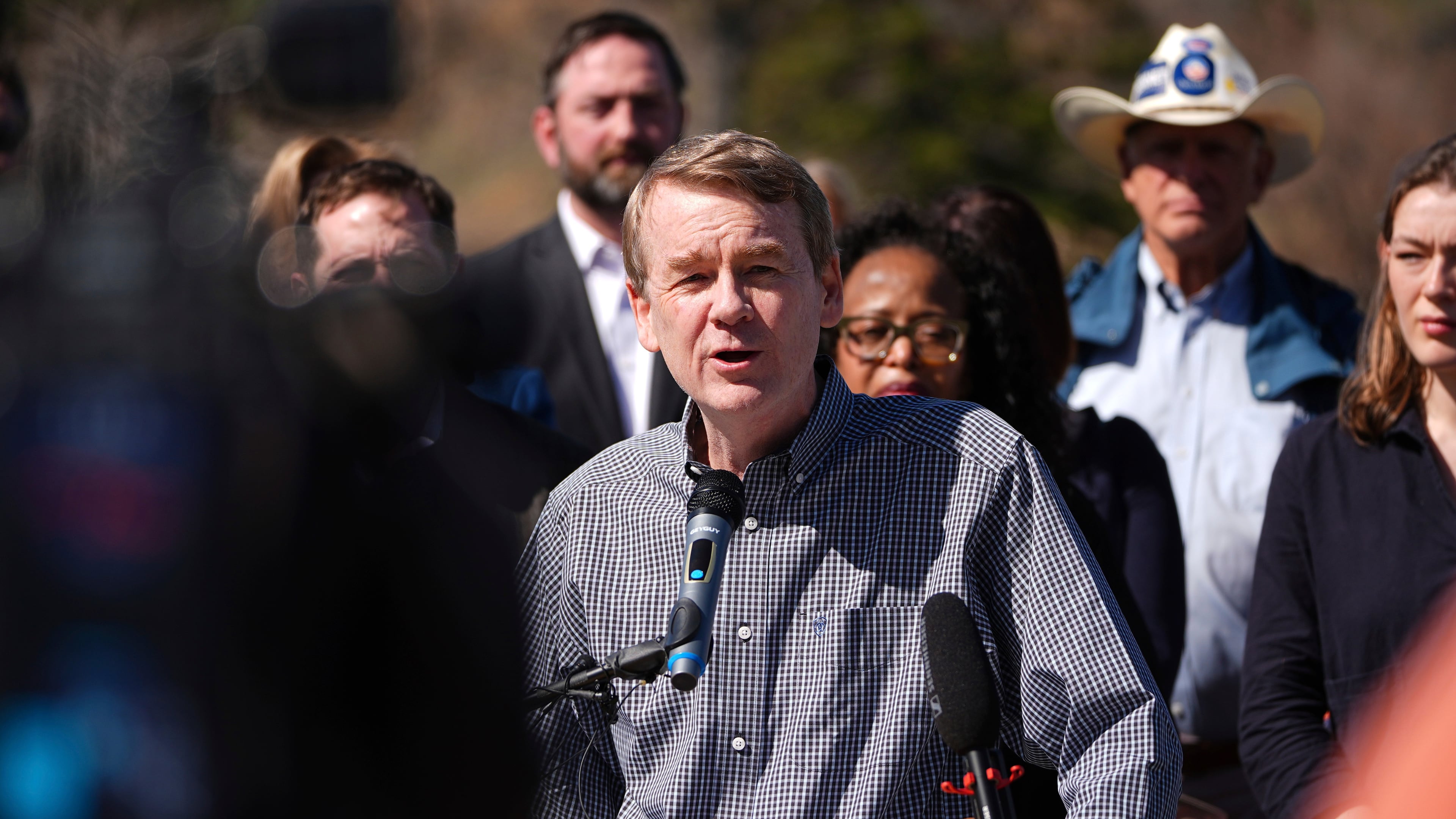 FILE - Sen. Michael Bennet, D-Colo., announces his plan to run for Colorado's governorship in the 2026 election at an event outside the Museum of Nature and Science, April 11, 2025, in Denver. (AP Photo/David Zalubowski, File)
