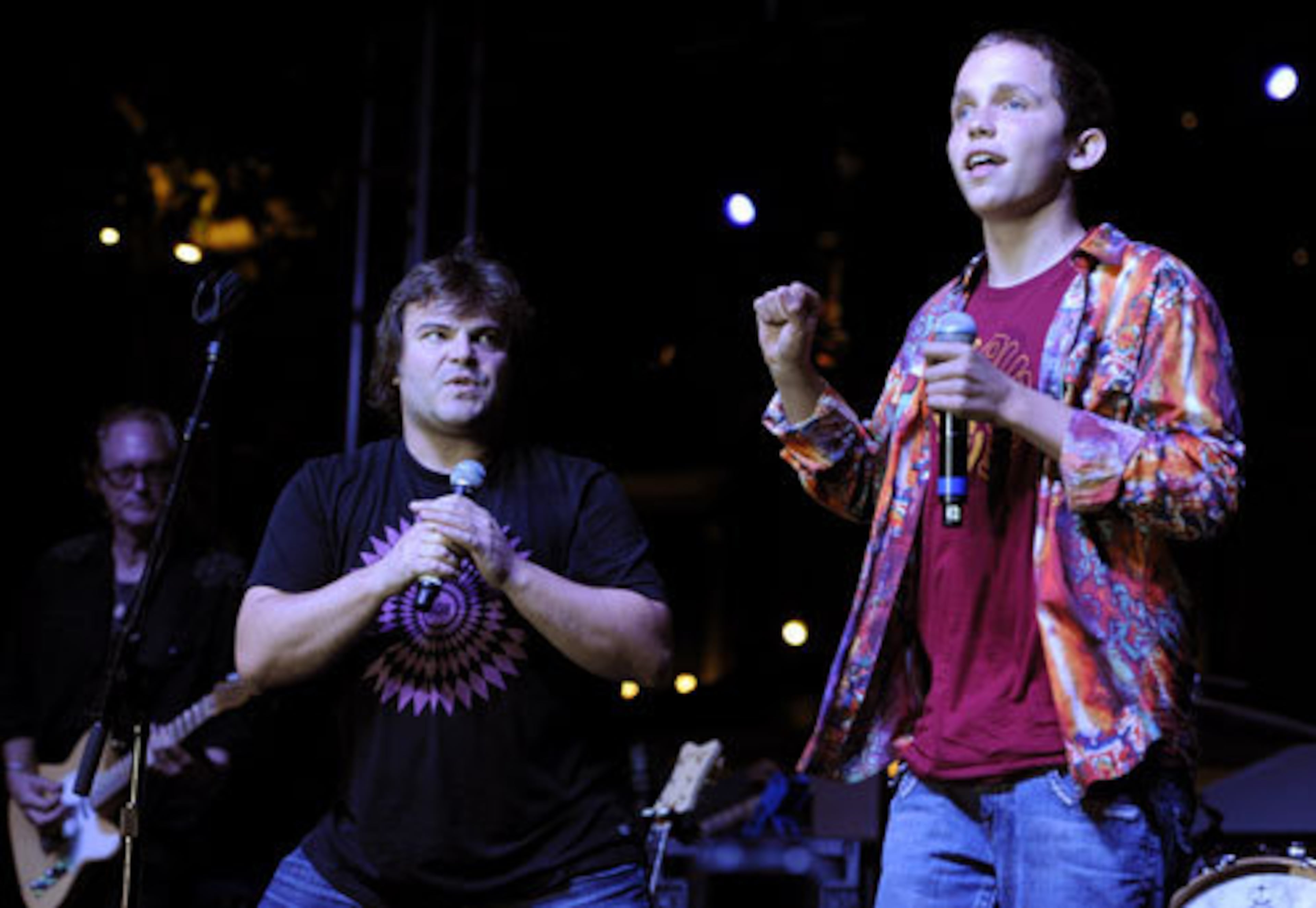 Jack Black looks on as Wyatt Isaacs performs.