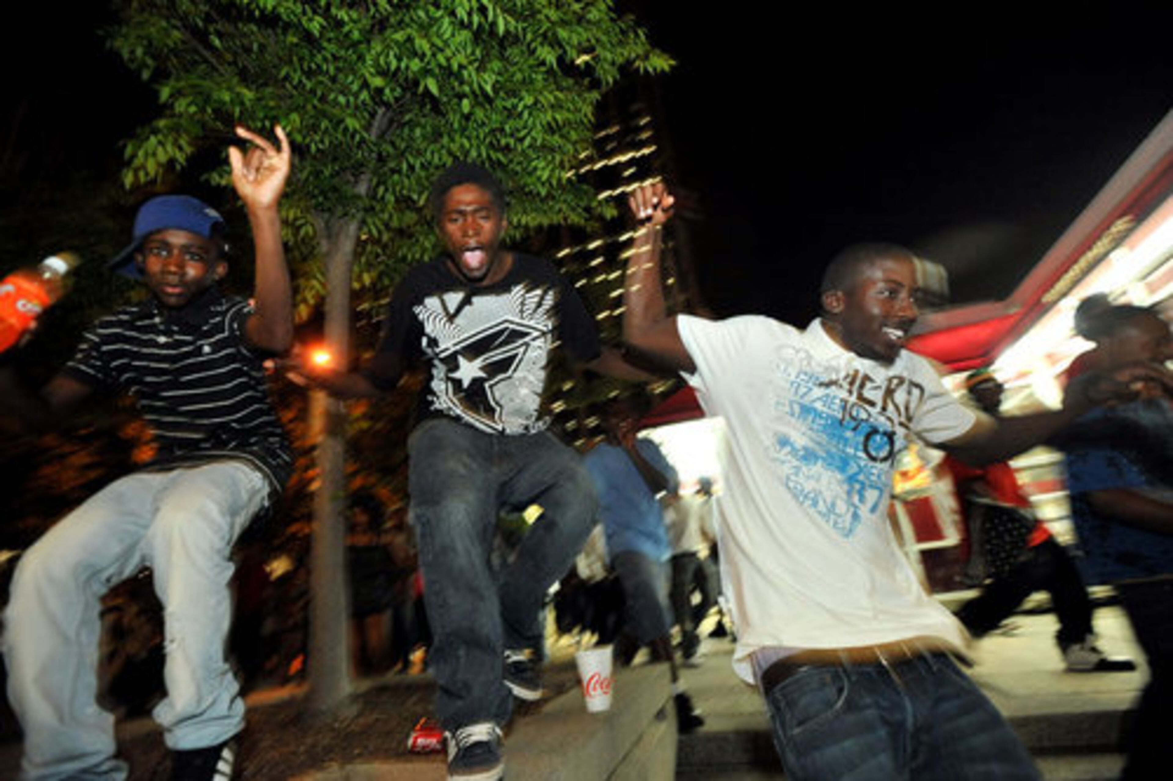 Freaknik attendants run away from Atlanta police late Saturday night at the Underground Atlanta.
