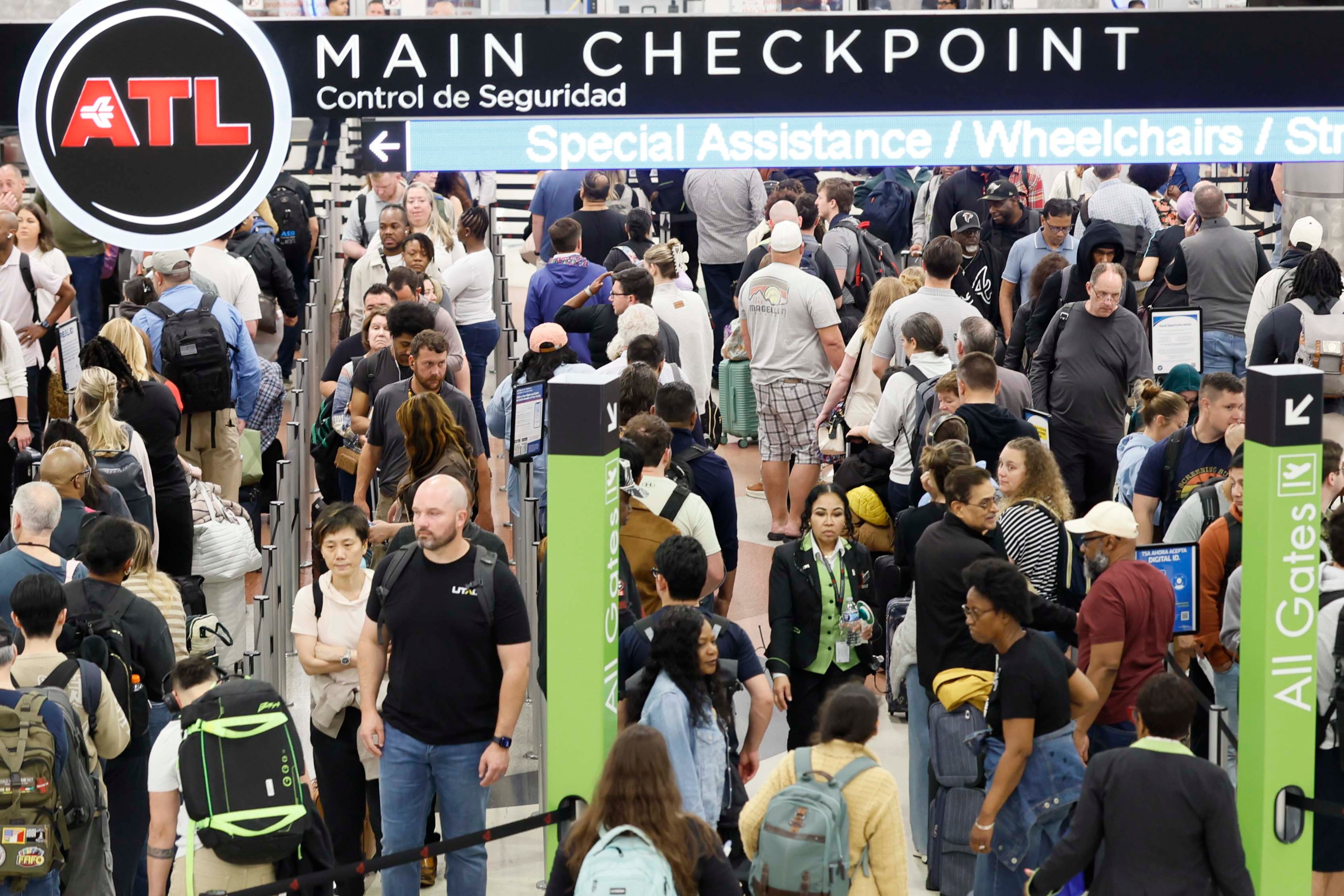 Travelers line up at the Main Checkpoint for TSA security checks early Monday morning at Hartsfield-Jackson Atlanta International Airport during the partial government shutdown on March 23, 2026. TSA officers have been working without pay for weeks amid the shutdown.
(Miguel Martinez/AJC)