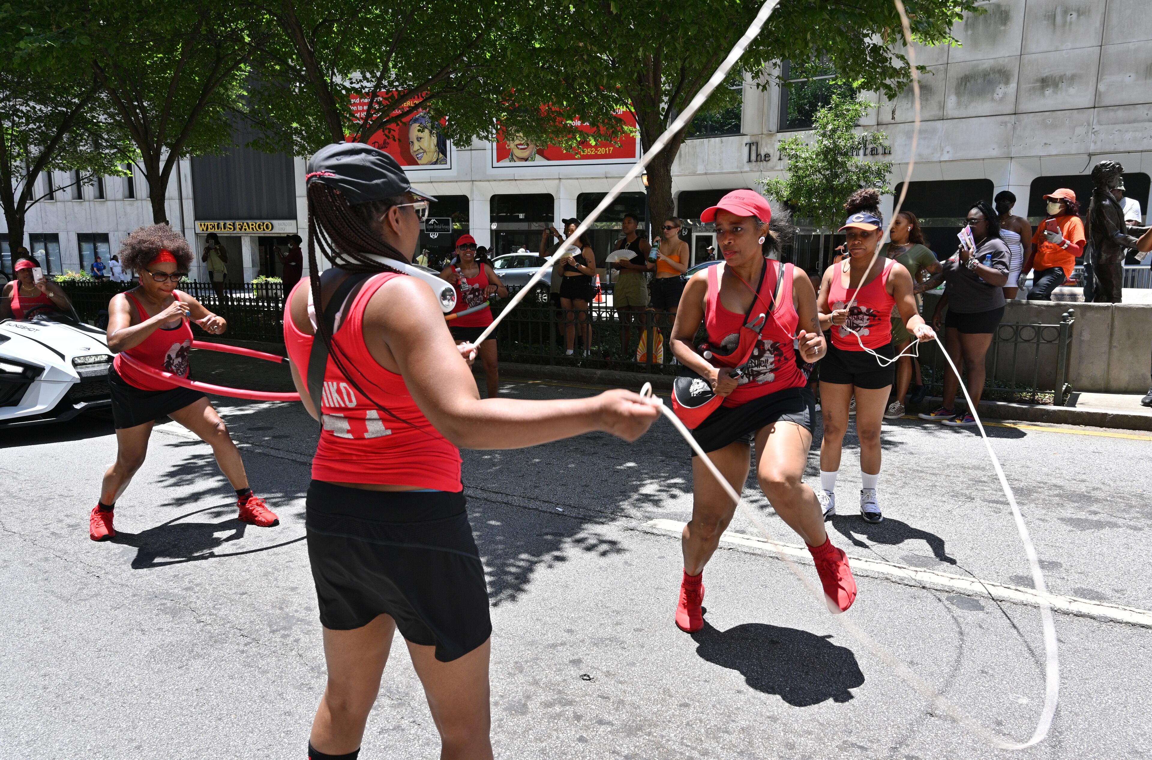 Women double dutch during the Juneteenth Atlanta Black History Parade on Saturday, June 18, 2022. Juneteenth, a June 19 holiday, recognizes the last African American slaves being freed in 1865, more than two years after the Emancipation Proclamation was signed. Now a federal holiday, Juneteenth celebrates African American freedom, history, culture, achievements and more. (Hyosub Shin / Hyosub.Shin@ajc.com)